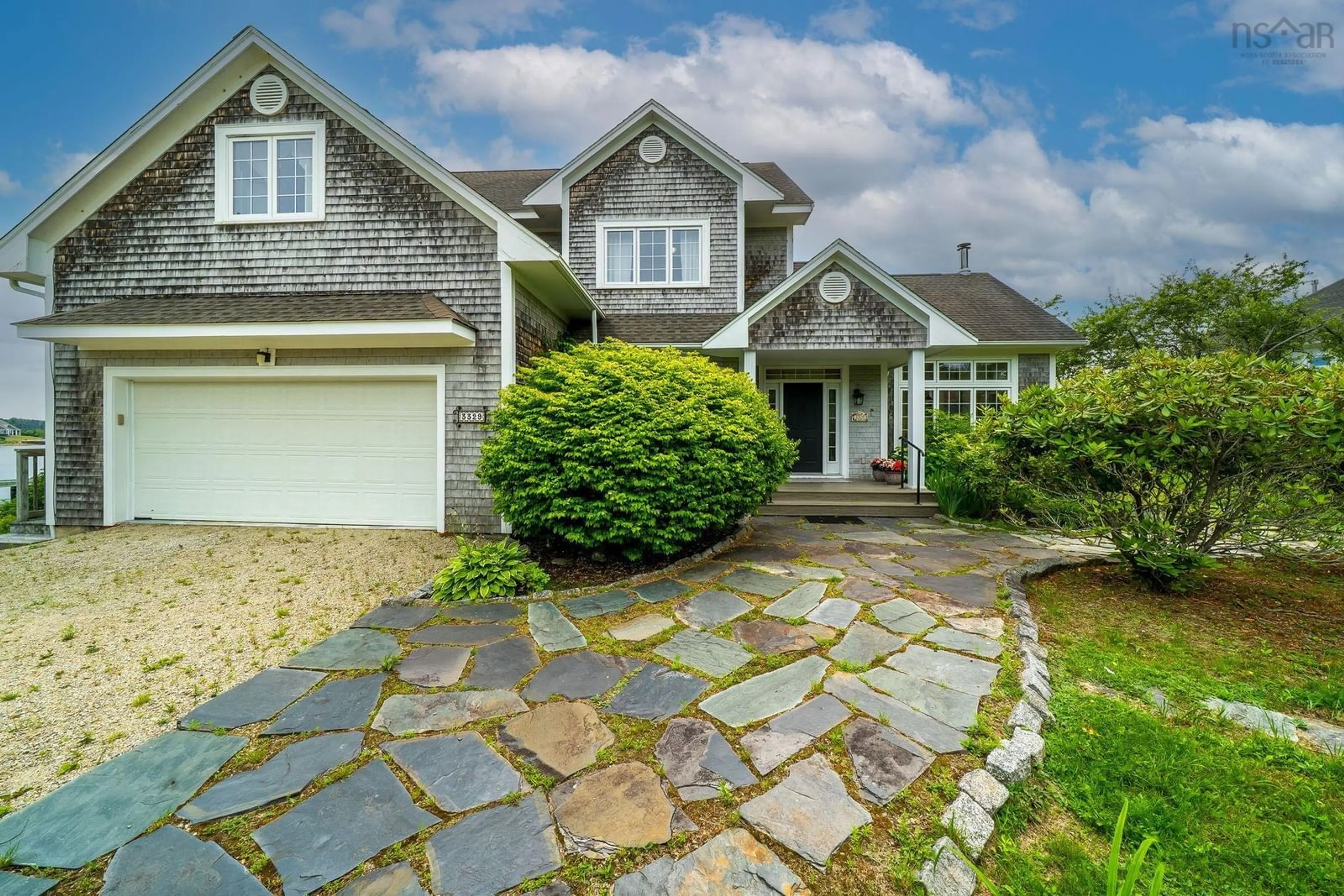 A pic from outside/outdoor area/front of a property/back of a property/a pic from drone, street for 3329 Highway 3, East Chester Nova Scotia B0J 1J0