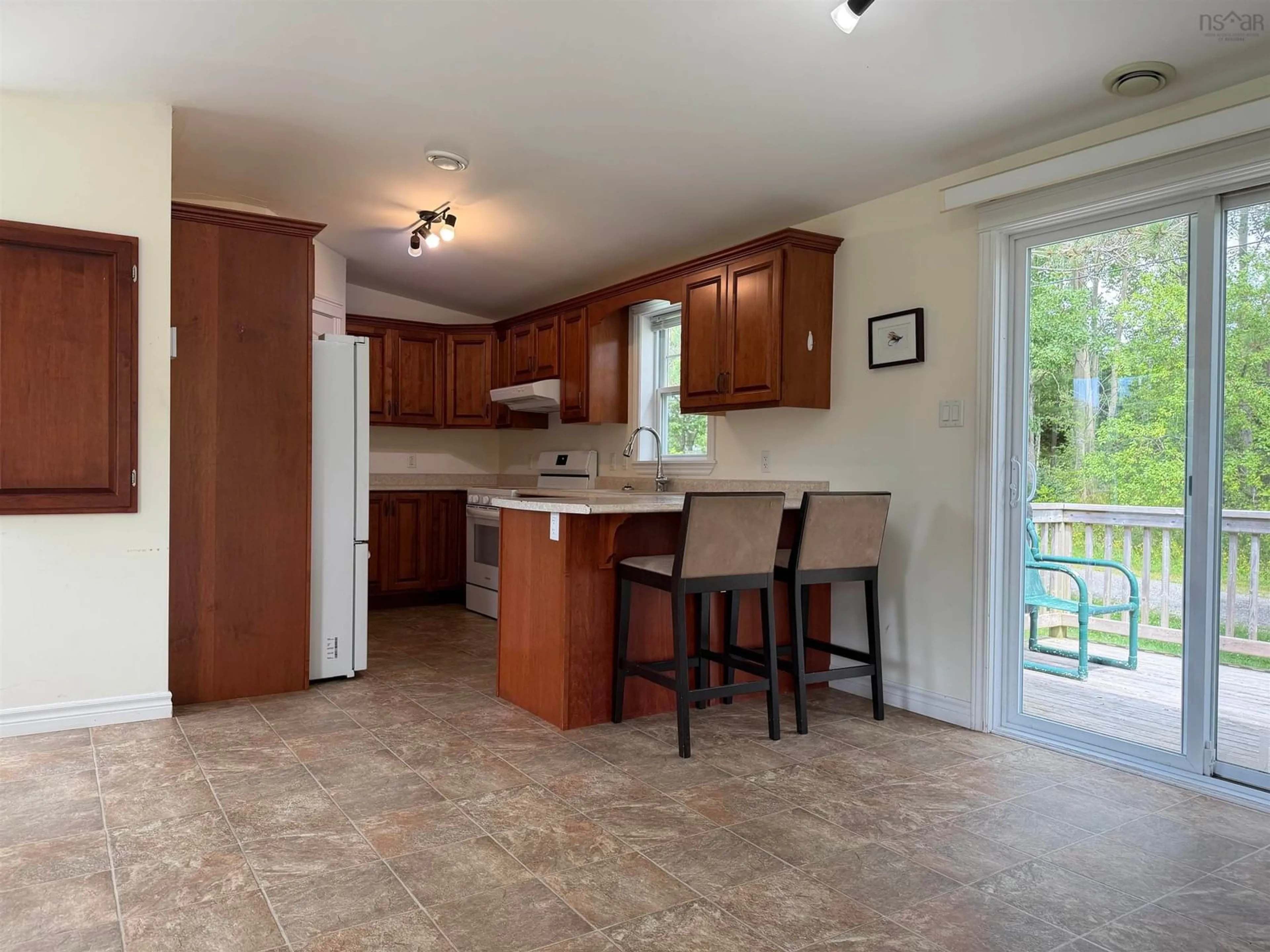 Open concept kitchen, ceramic/tile floor for 10346 377 Hwy, Malignant Cove Nova Scotia B2G 2L1