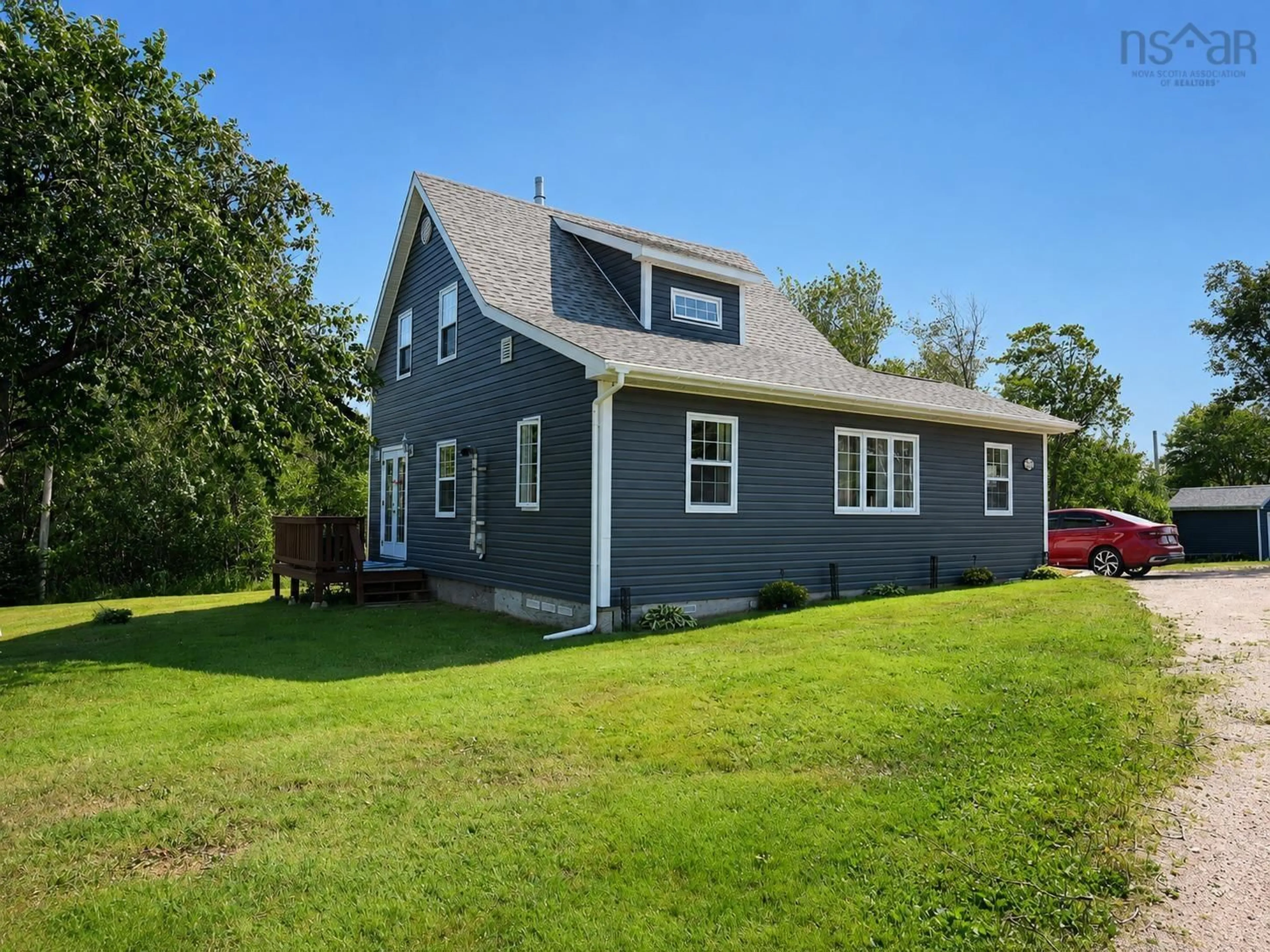Home with vinyl exterior material, street for 29182 Cabot Trail, Cape North Nova Scotia B0C 1G0