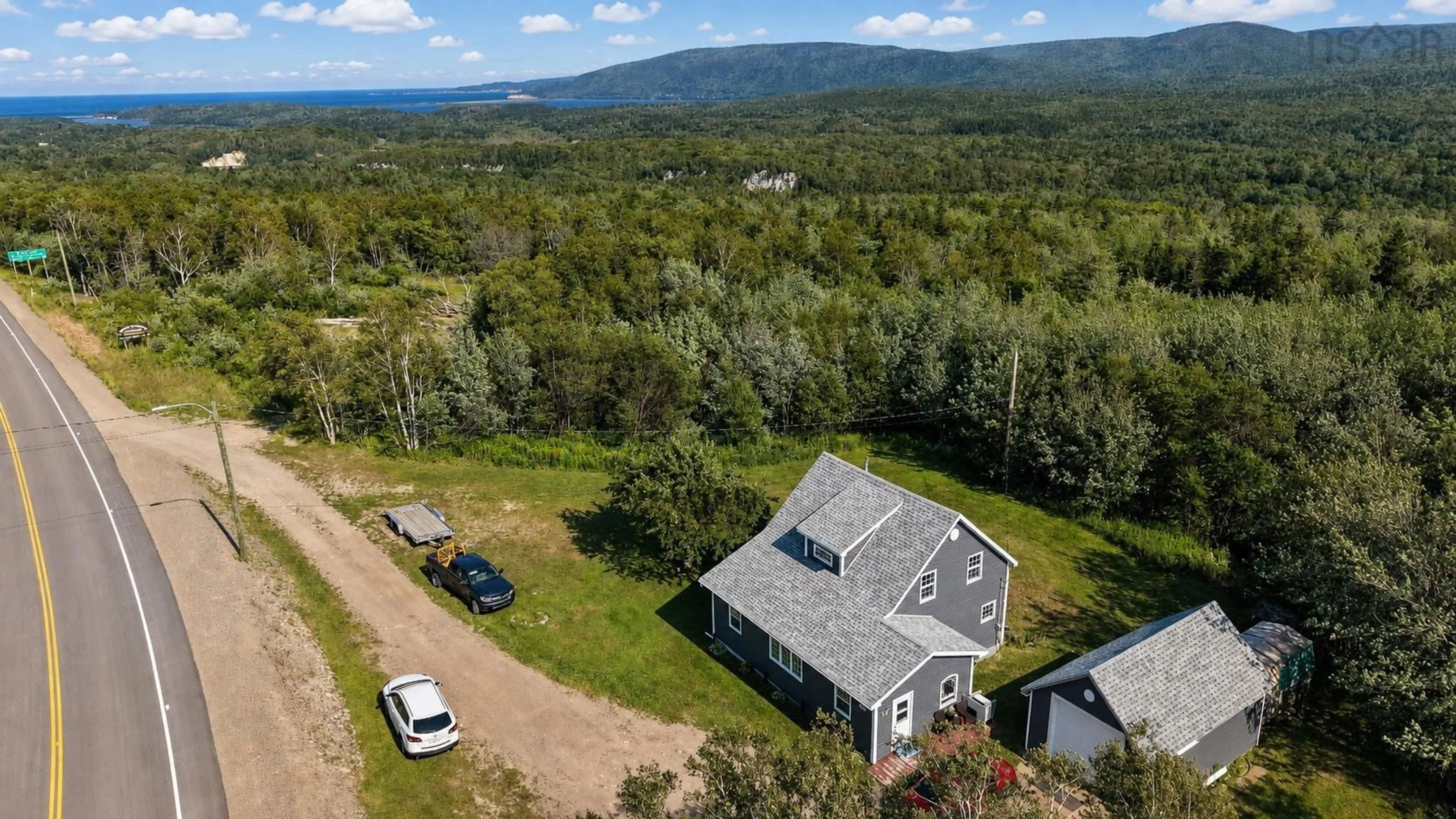 A pic from outside/outdoor area/front of a property/back of a property/a pic from drone, mountain view for 29182 Cabot Trail, Cape North Nova Scotia B0C 1G0