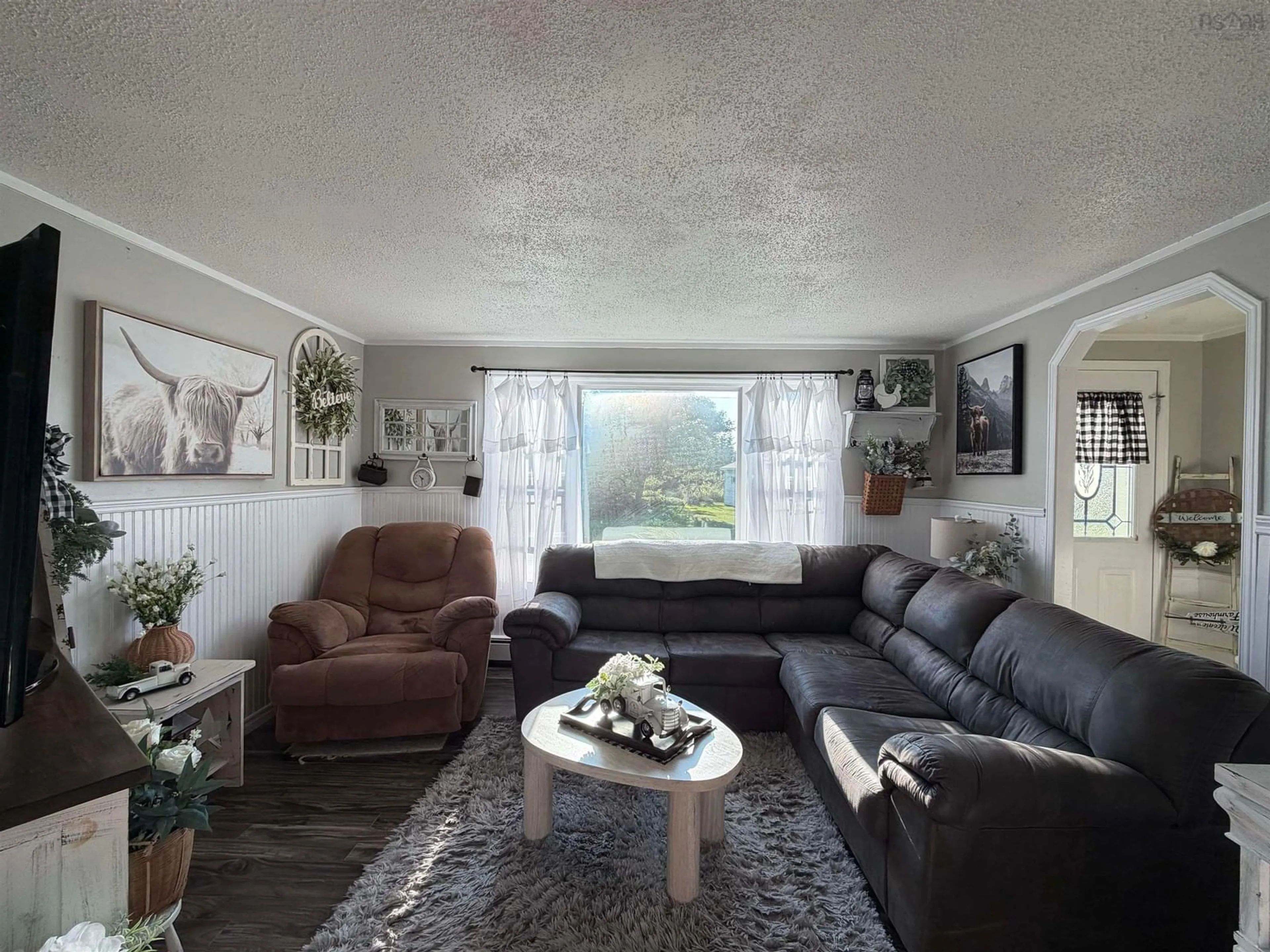 Living room with furniture, unknown for 22 Harold St, Clark's Harbour Nova Scotia B0W 1P0