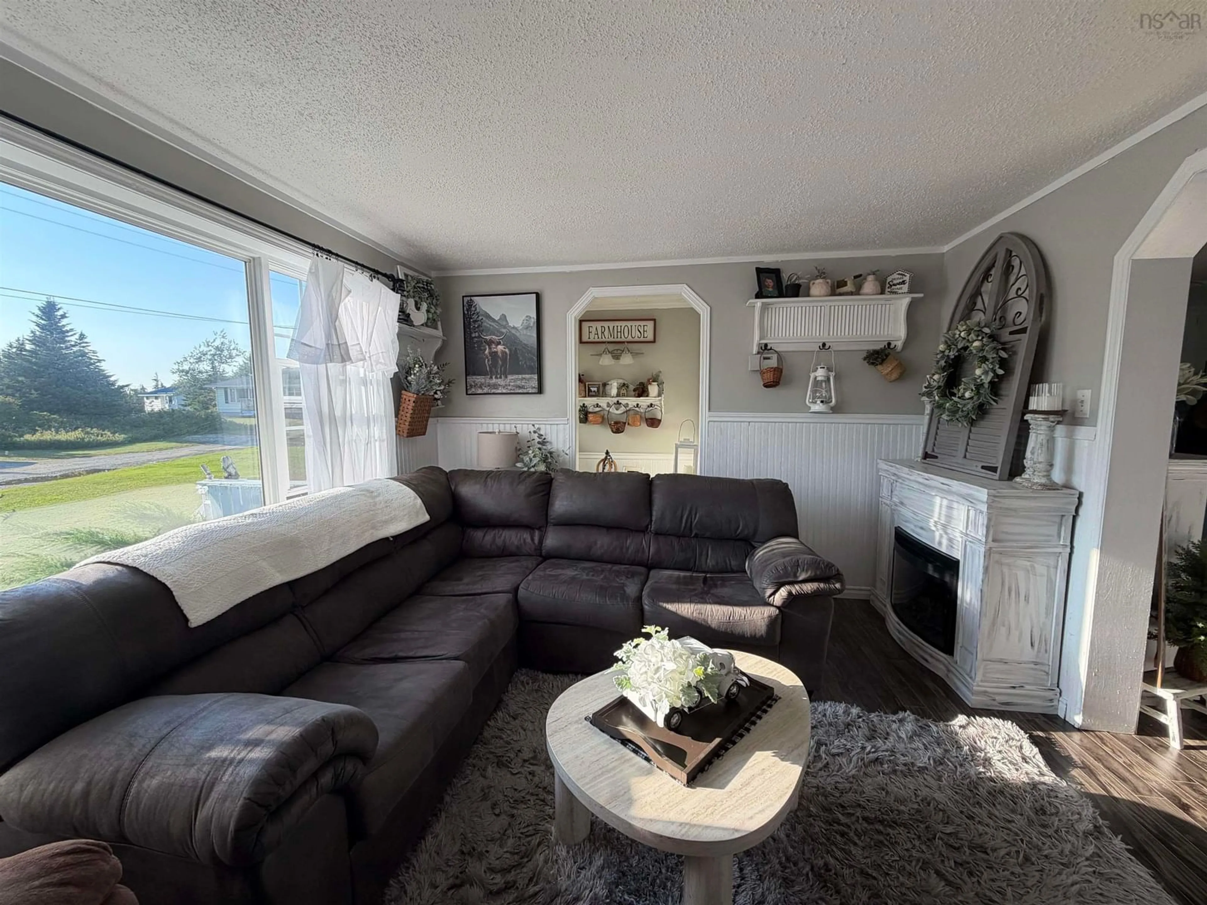 Living room with furniture, unknown for 22 Harold St, Clark's Harbour Nova Scotia B0W 1P0