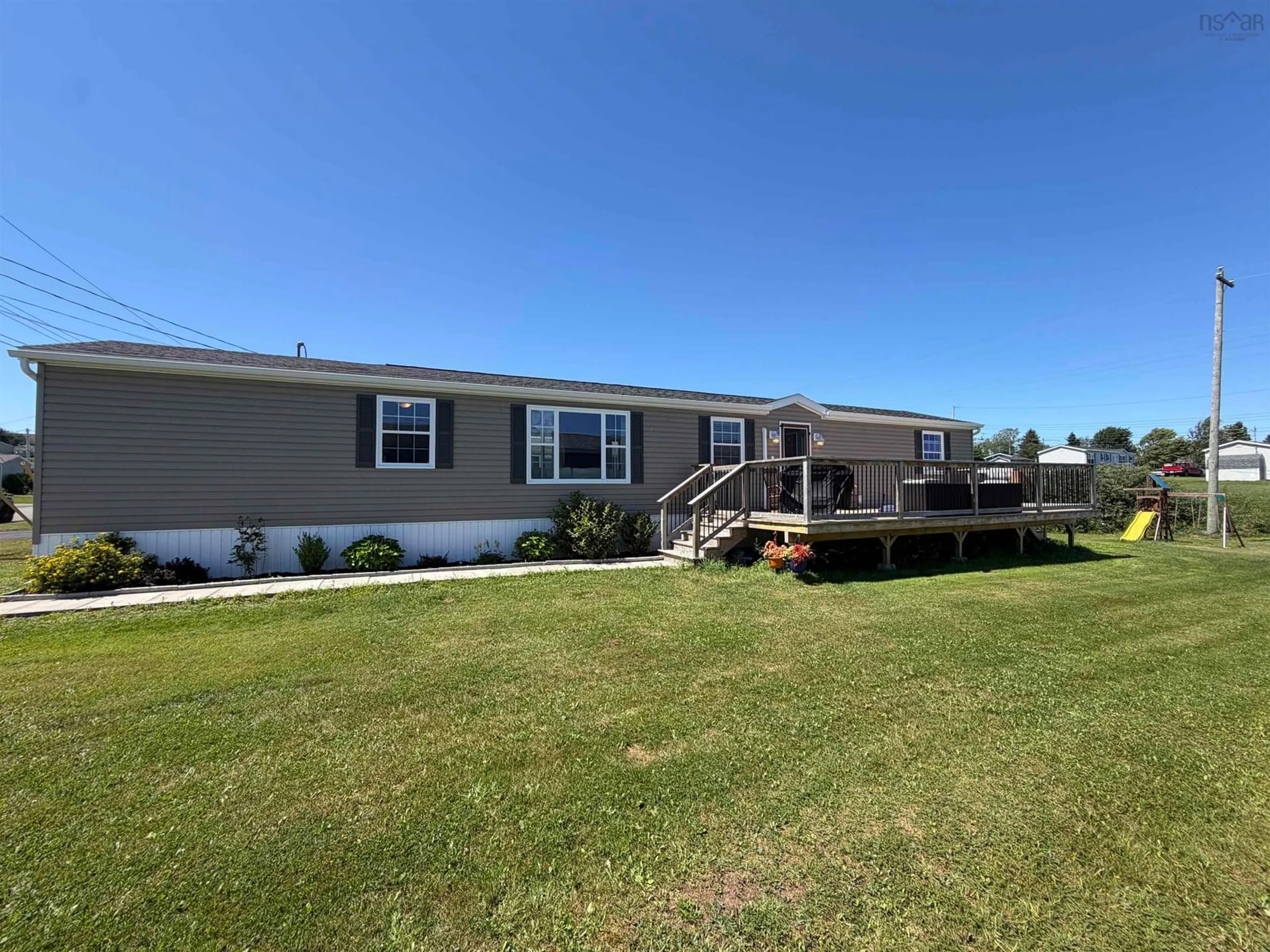 A pic from outside/outdoor area/front of a property/back of a property/a pic from drone, water/lake/river/ocean view for 14 South Hill Dr, West River Nova Scotia B2G 2V9