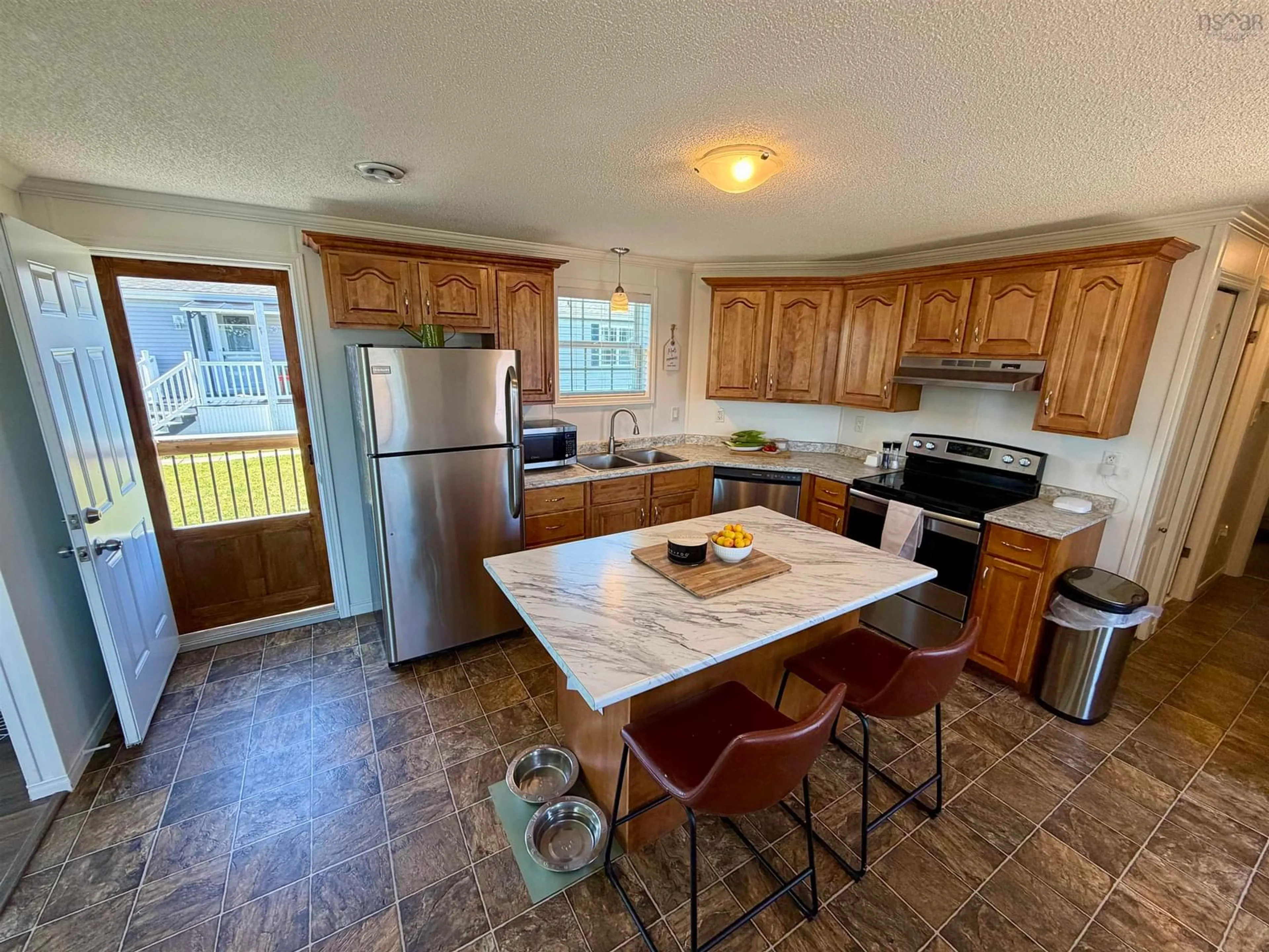 Open concept kitchen, unknown for 14 South Hill Dr, West River Nova Scotia B2G 2V9