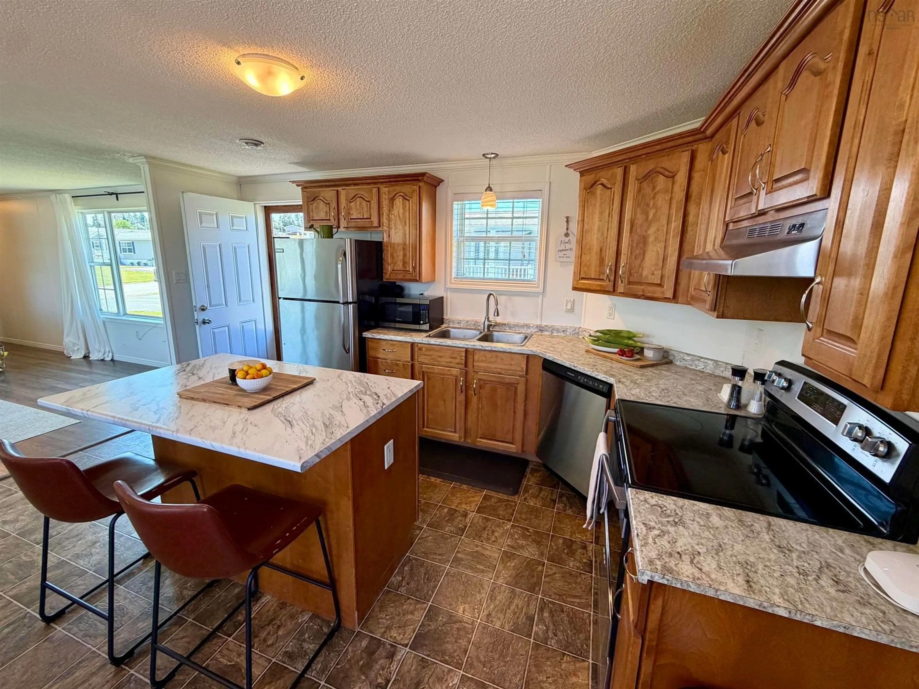 Open concept kitchen, ceramic/tile floor for 14 South Hill Dr, West River Nova Scotia B2G 2V9