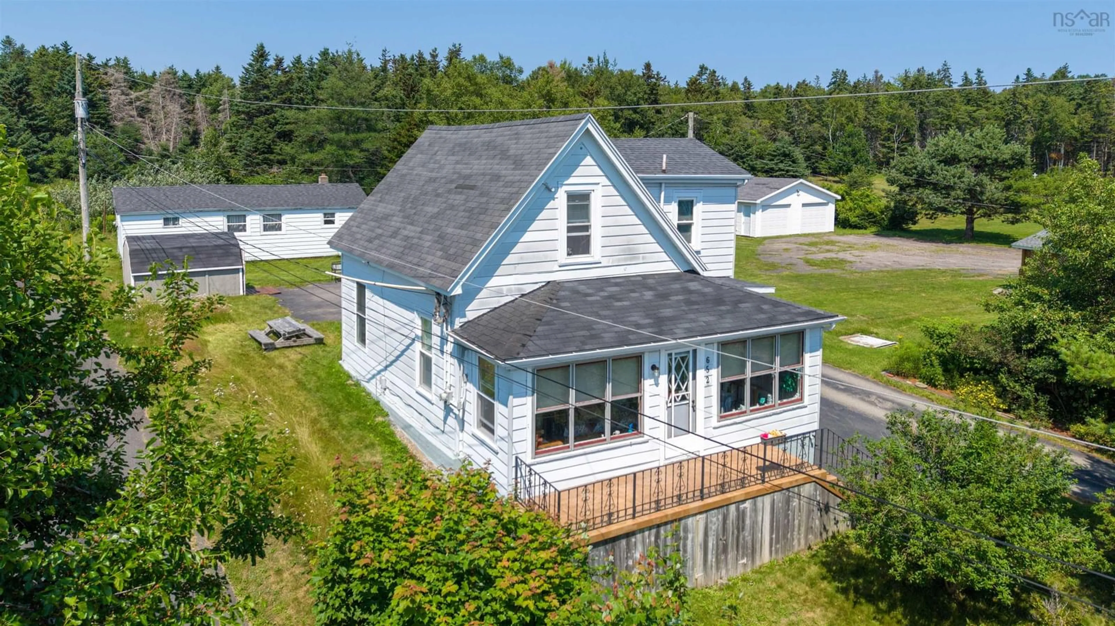 A pic from outside/outdoor area/front of a property/back of a property/a pic from drone, water/lake/river/ocean view for 652 Shore Rd, Sydney Mines Nova Scotia B1V 1A1