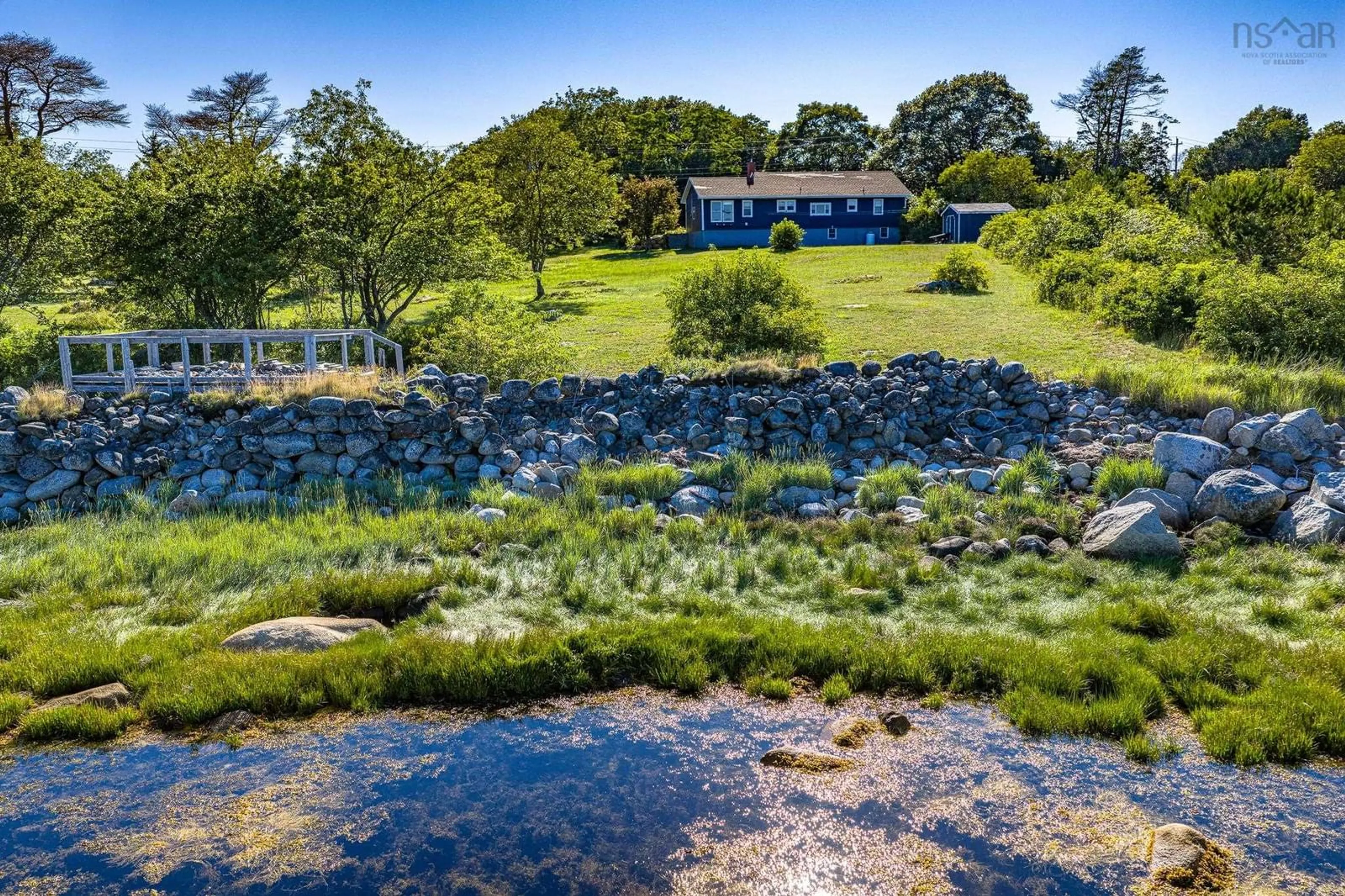 A pic from outside/outdoor area/front of a property/back of a property/a pic from drone, water/lake/river/ocean view for 339 Port Latour Rd, Port Clyde Nova Scotia B0W 2S0