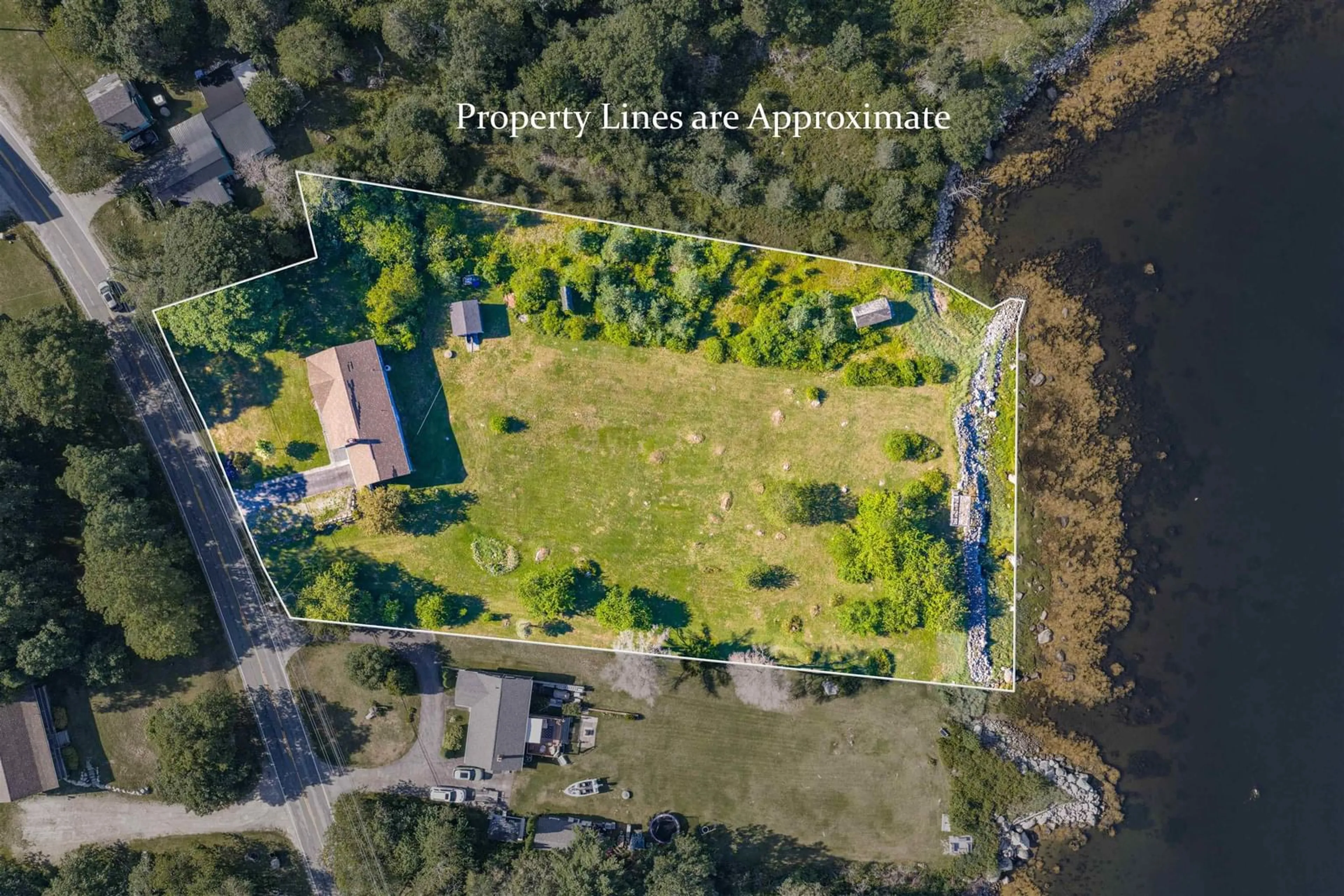 A pic from outside/outdoor area/front of a property/back of a property/a pic from drone, water/lake/river/ocean view for 339 Port Latour Rd, Port Clyde Nova Scotia B0W 2S0