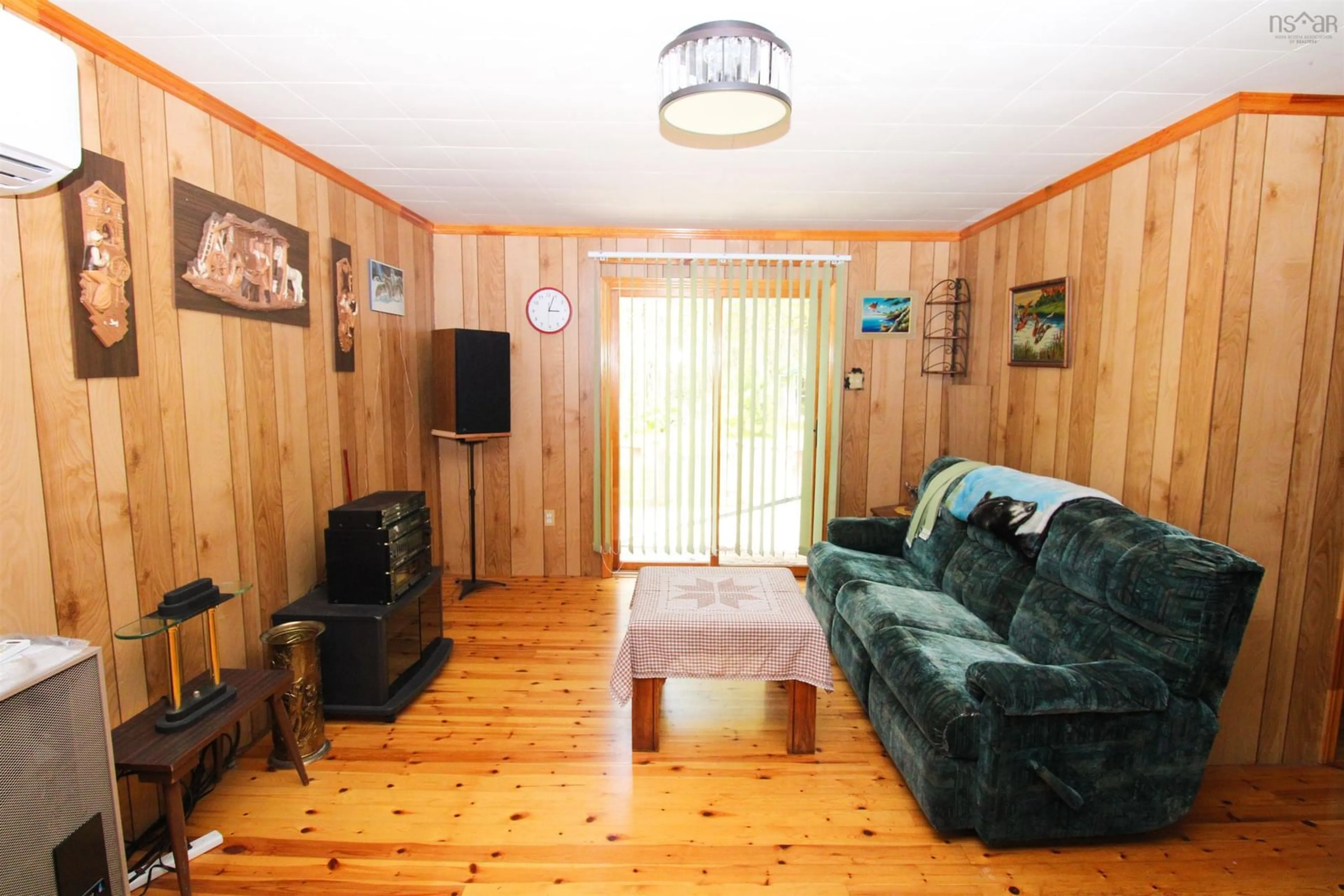 Living room with furniture, wood/laminate floor for 507 Turner Point Dr, Walden Nova Scotia B0J 2E0