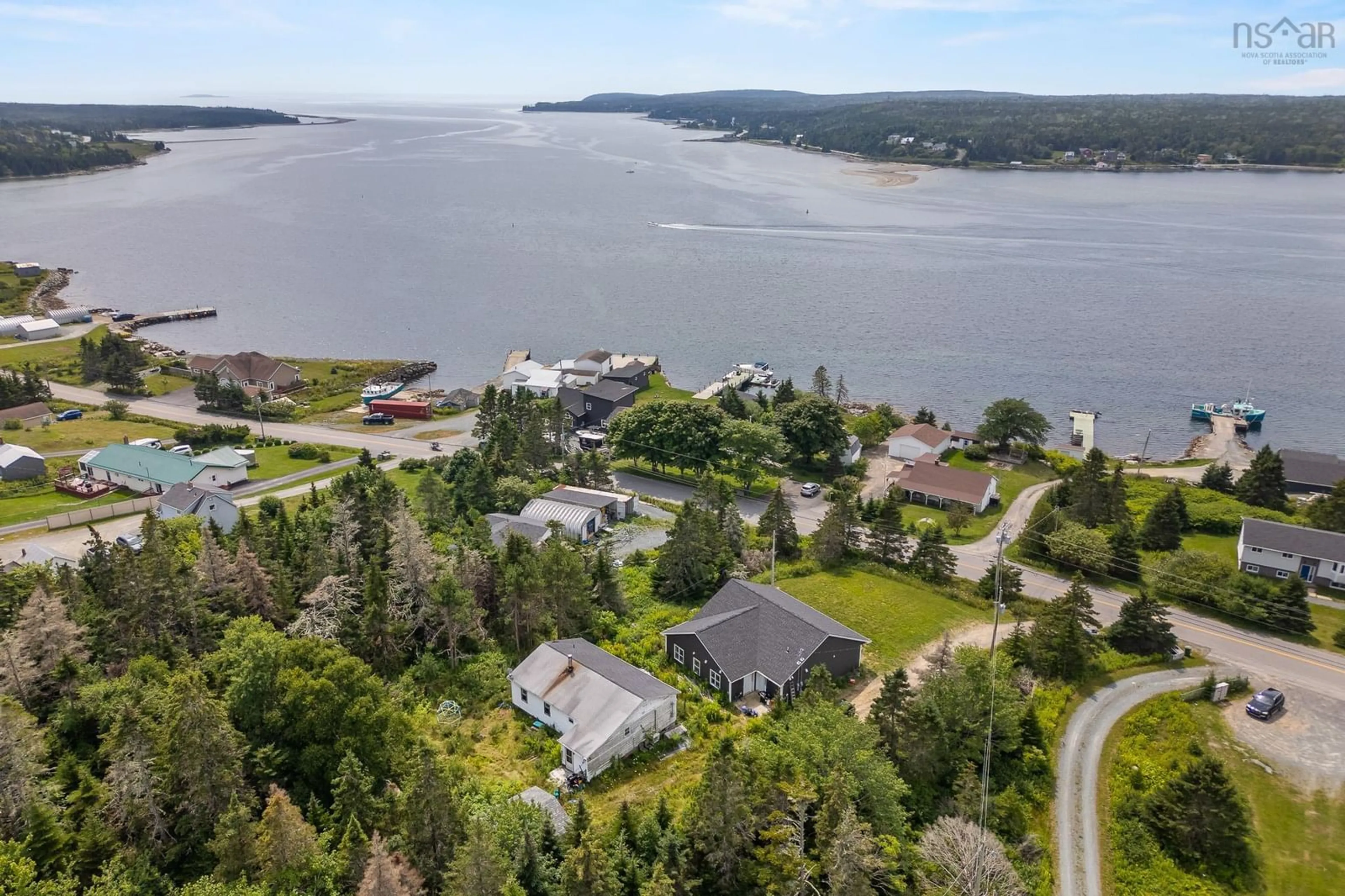 A pic from outside/outdoor area/front of a property/back of a property/a pic from drone, water/lake/river/ocean view for 1427/1425 East Jeddore Rd, East Jeddore Nova Scotia B0J 2L0