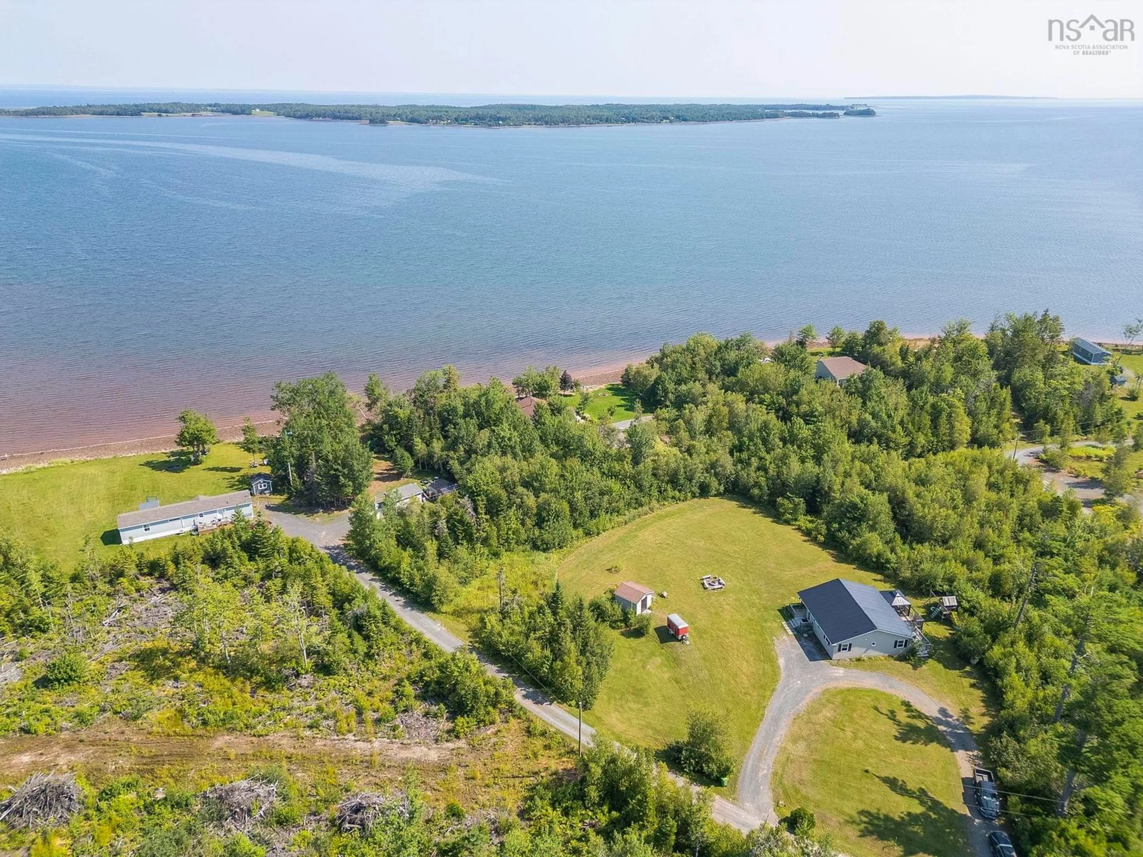 A pic from outside/outdoor area/front of a property/back of a property/a pic from drone, water/lake/river/ocean view for 123 Dragon Fly Lane Lane, Three Brooks Nova Scotia B0K 1H0