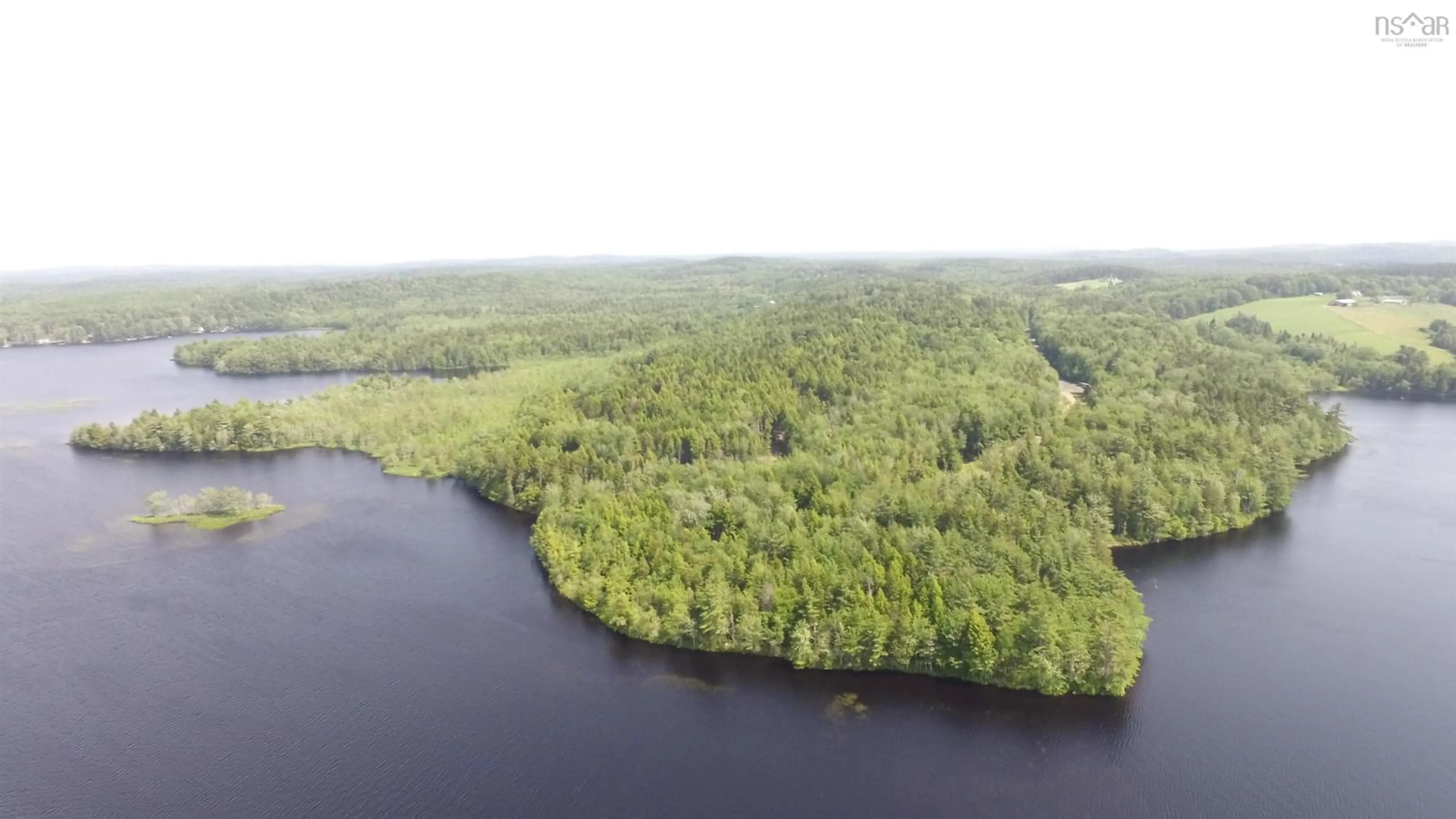 A pic from outside/outdoor area/front of a property/back of a property/a pic from drone, water/lake/river/ocean view for 63 Frank Rd, Italy Cross Nova Scotia B4V 0N3