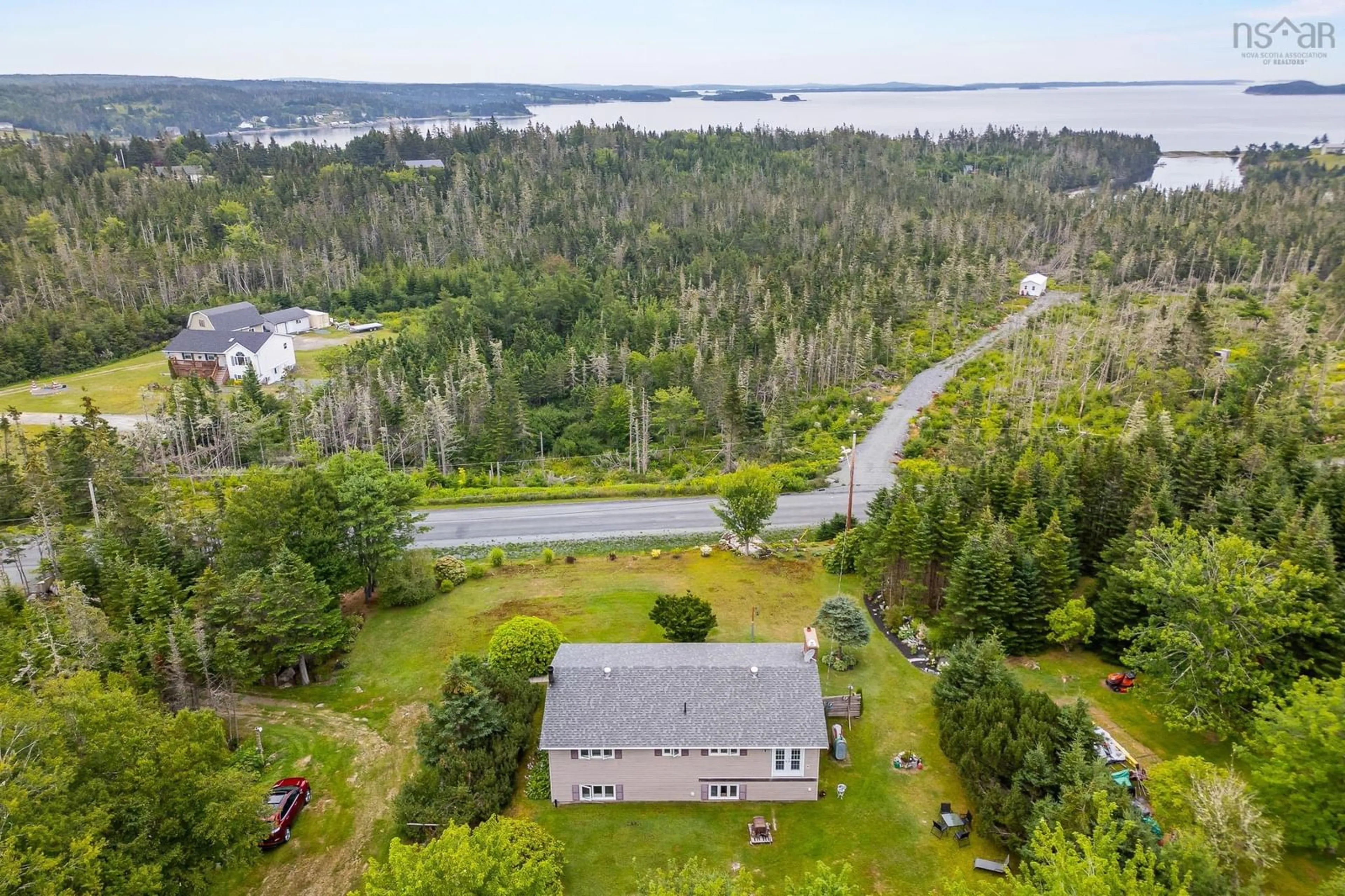 A pic from outside/outdoor area/front of a property/back of a property/a pic from drone, water/lake/river/ocean view for 62 Murphys Rd, Murphy Cove Nova Scotia B0J 3H0
