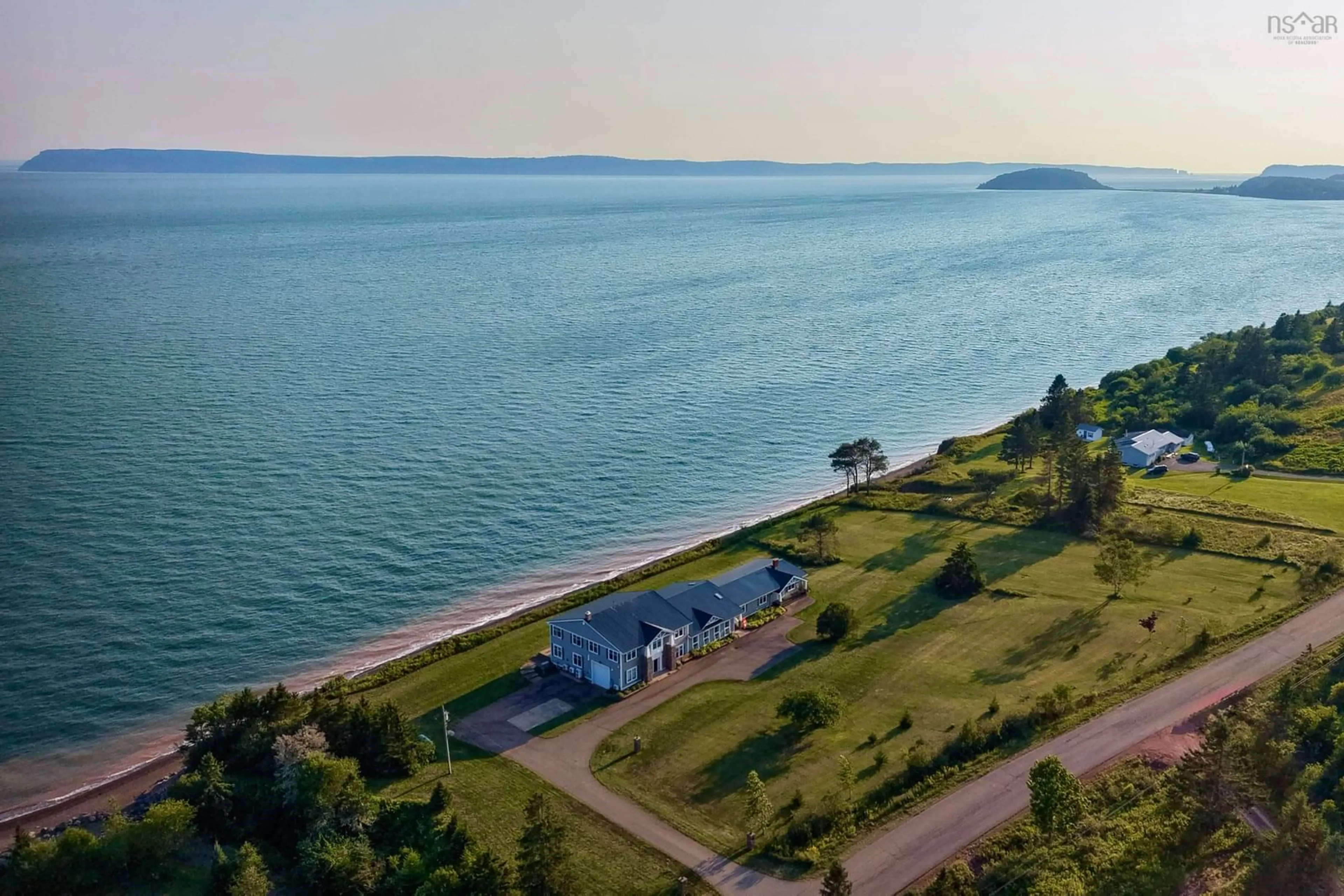 A pic from outside/outdoor area/front of a property/back of a property/a pic from drone, water/lake/river/ocean view for 1212 Two Islands Rd, Greenhill Nova Scotia B0M 1S0