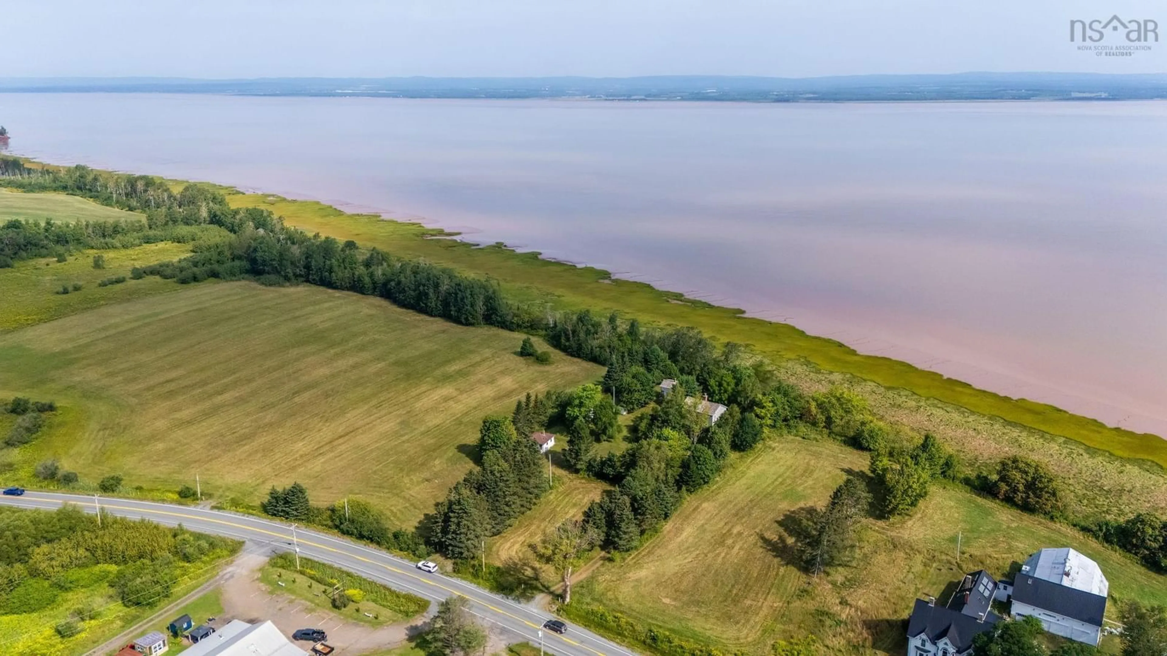 A pic from outside/outdoor area/front of a property/back of a property/a pic from drone, water/lake/river/ocean view for 8535 215 Hwy, Maitland Nova Scotia B6L 5H3
