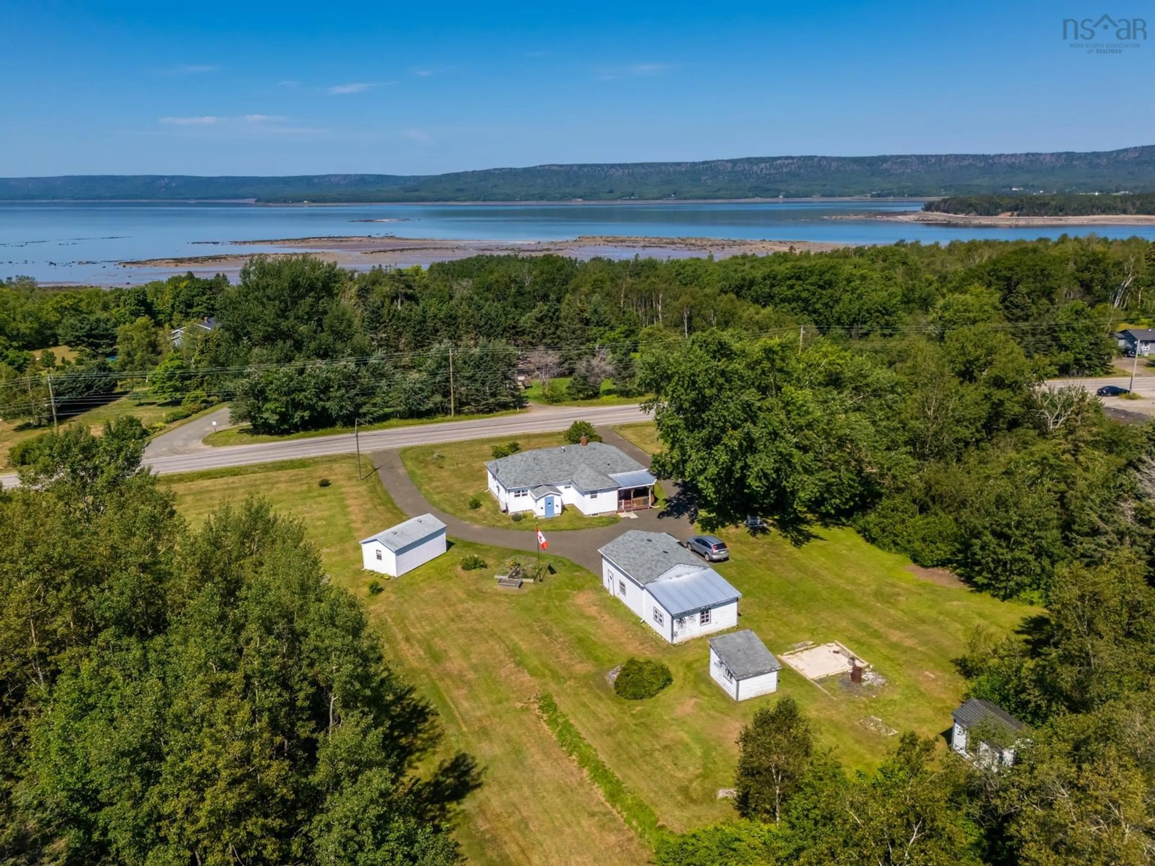 A pic from outside/outdoor area/front of a property/back of a property/a pic from drone, water/lake/river/ocean view for 2252 Highway 1, Upper Clements Nova Scotia B0S 1A0