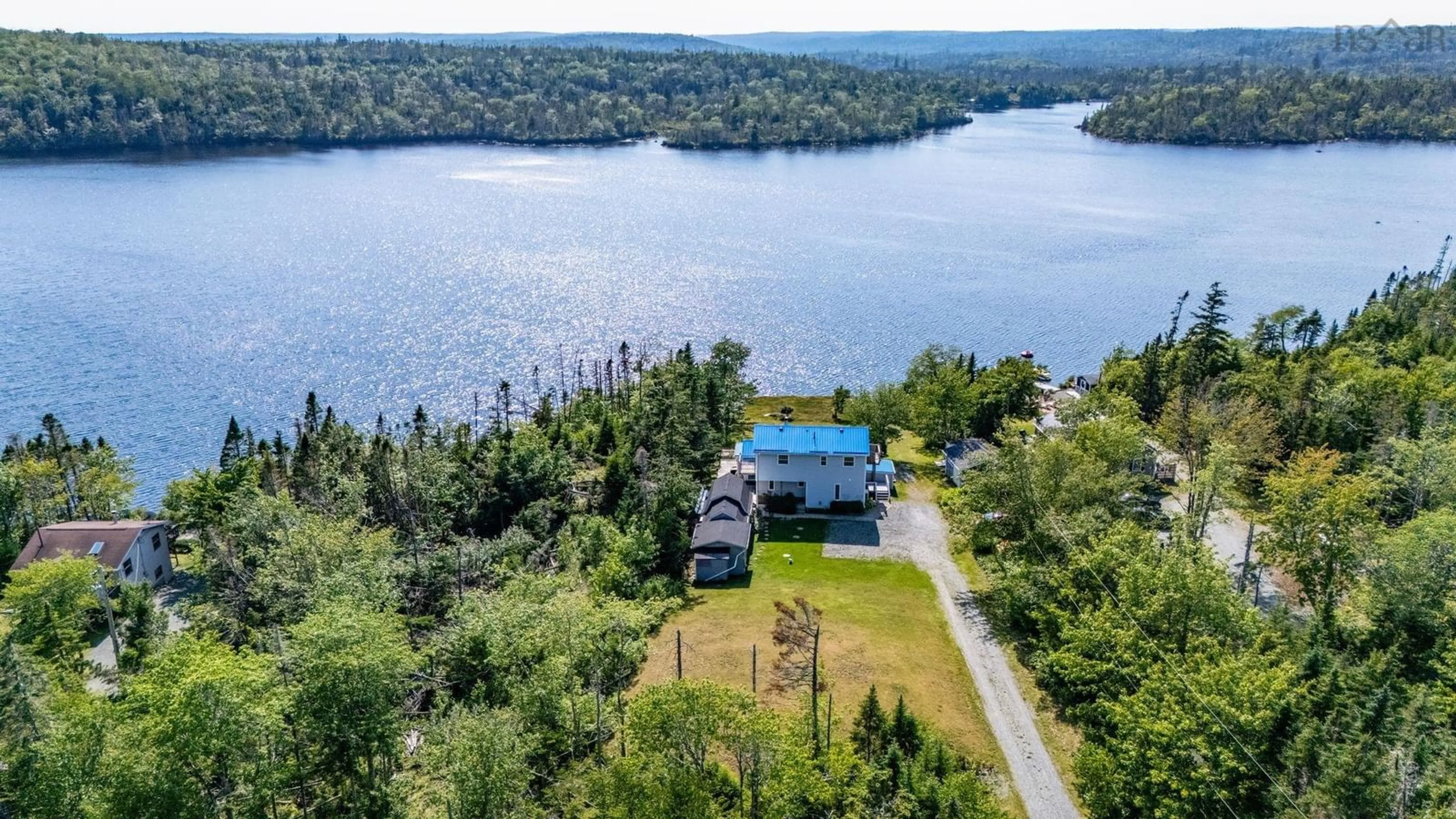 A pic from outside/outdoor area/front of a property/back of a property/a pic from drone, water/lake/river/ocean view for 1143 Mooseleand Rd, Tangier Nova Scotia B0J 3H0