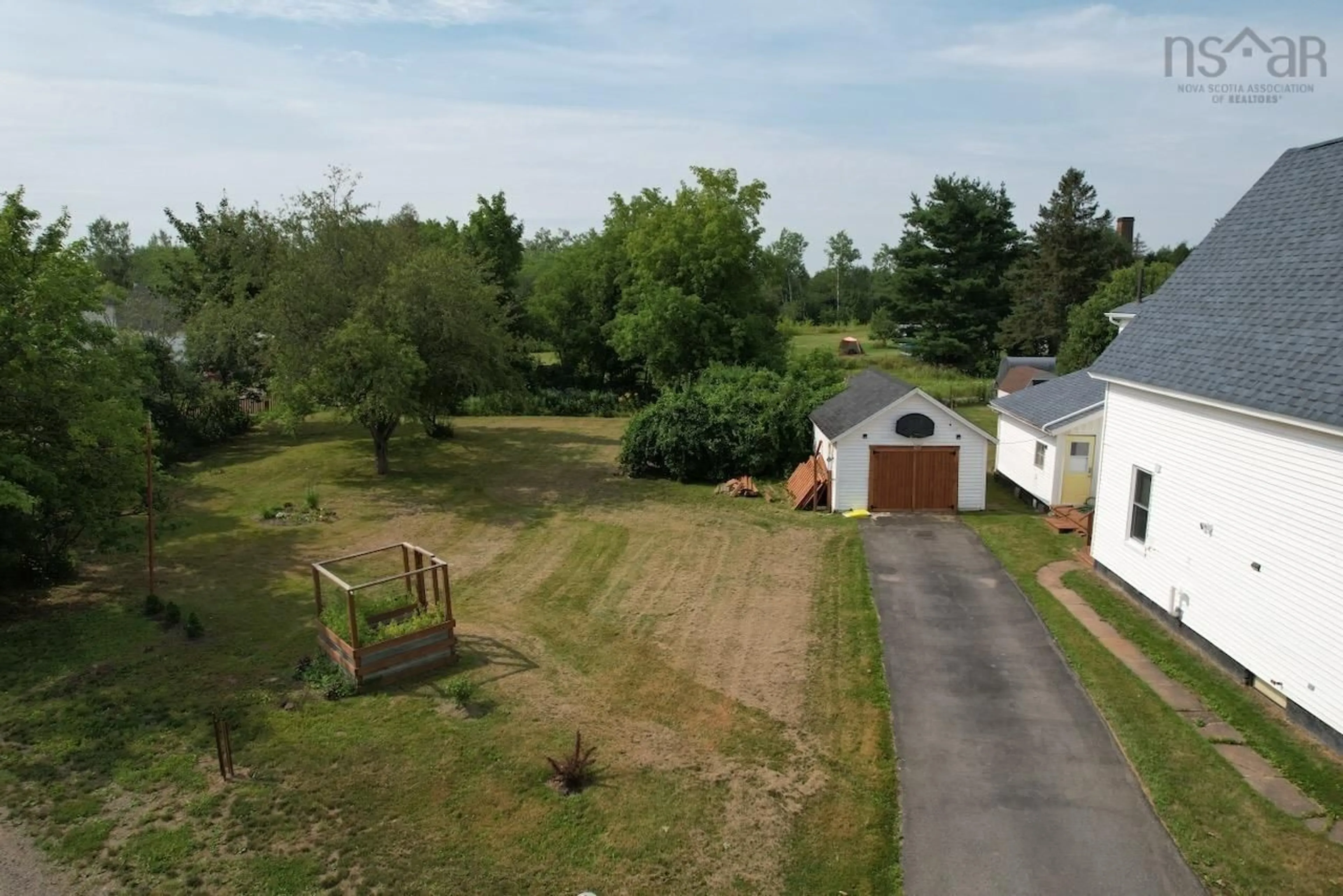 A pic from outside/outdoor area/front of a property/back of a property/a pic from drone, unknown for 23 River Ave, Oxford Nova Scotia B0M 1P0
