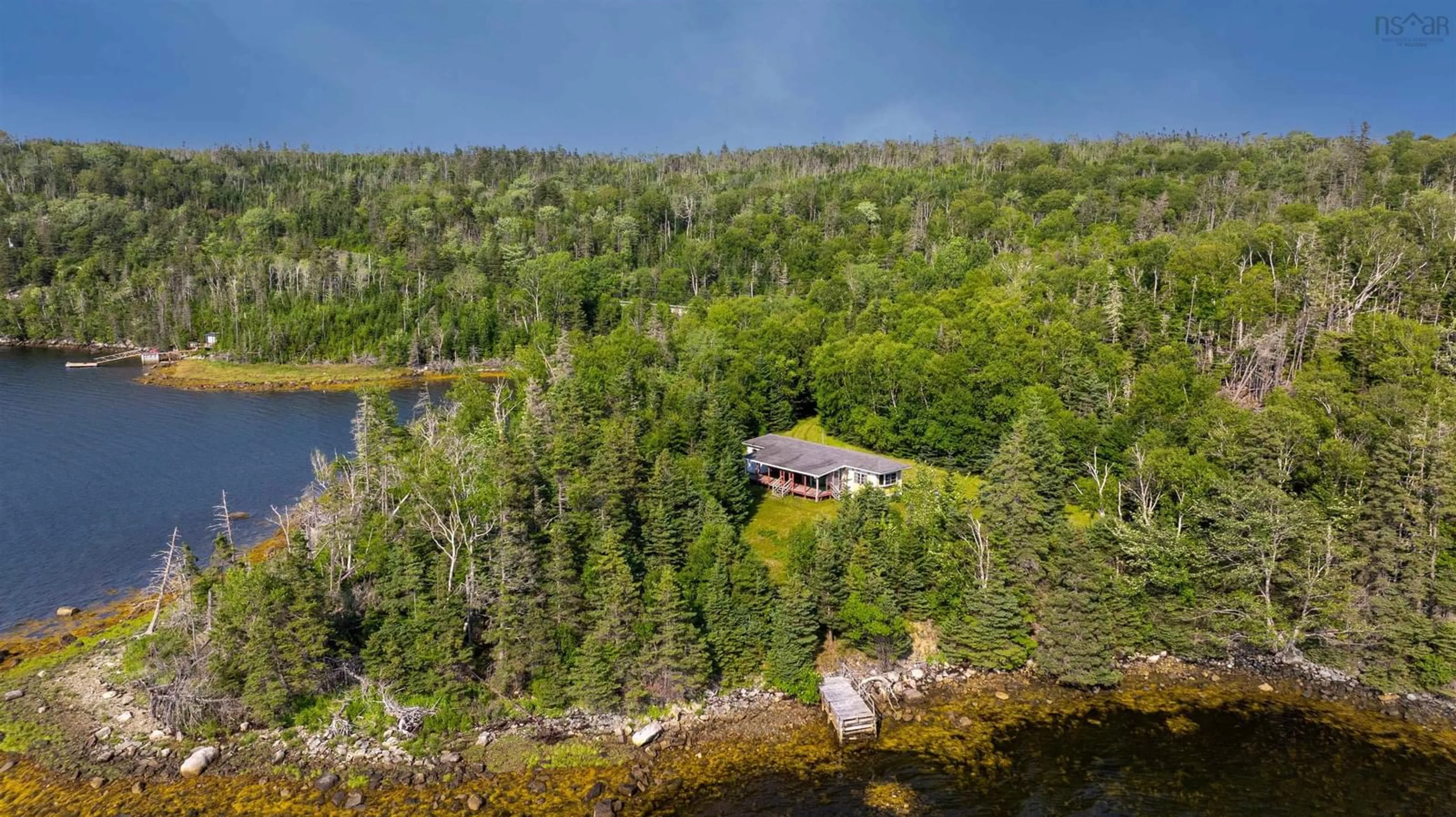 A pic from outside/outdoor area/front of a property/back of a property/a pic from drone, water/lake/river/ocean view for 14658 Highway 7 Hwy, East Ship Harbour Nova Scotia B0J 3H0