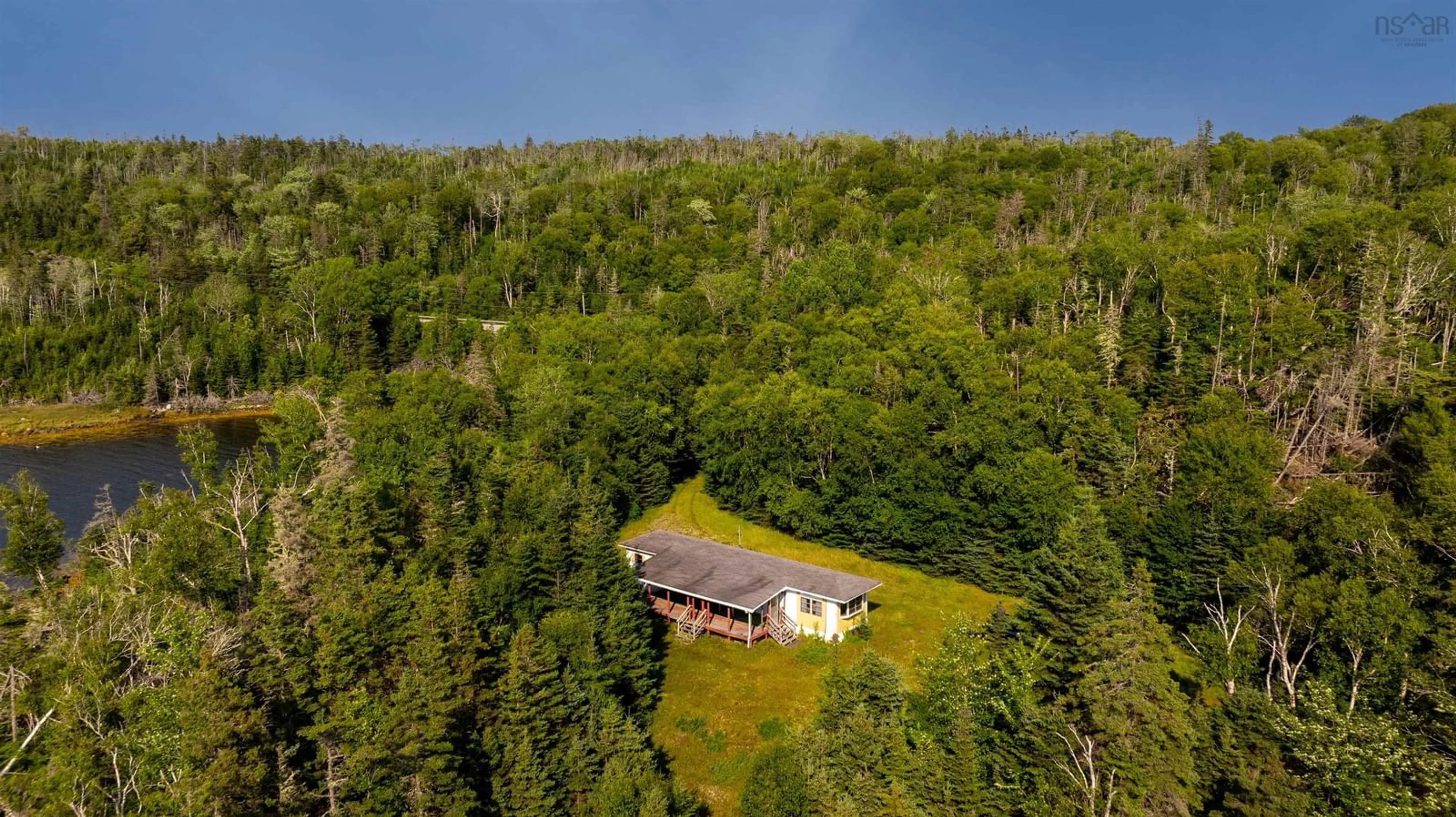 A pic from outside/outdoor area/front of a property/back of a property/a pic from drone, forest/trees view for 14658 Highway 7 Hwy, East Ship Harbour Nova Scotia B0J 3H0