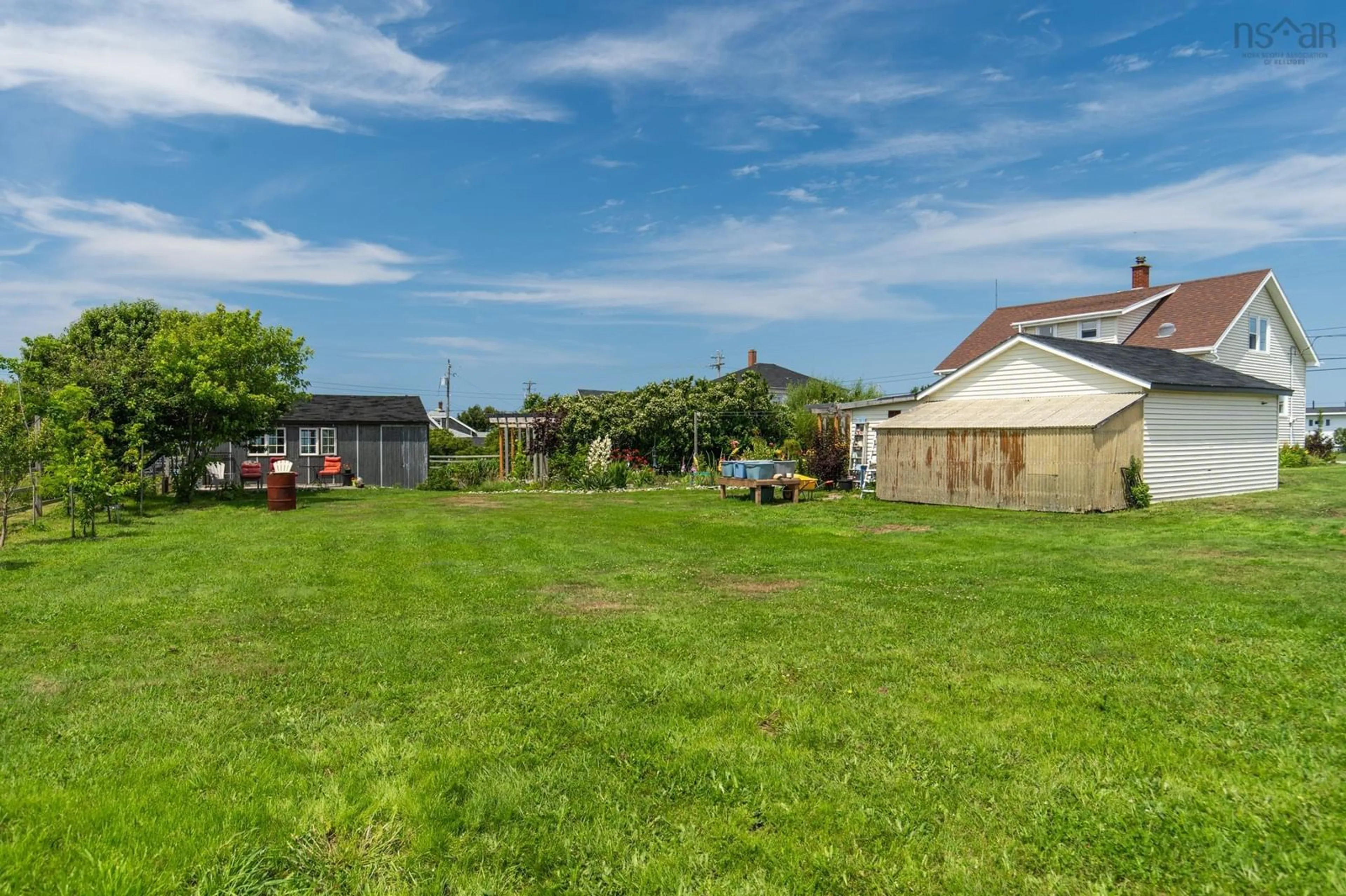 A pic from outside/outdoor area/front of a property/back of a property/a pic from drone, street for 3304 Main Shore Rd, Port Maitland Nova Scotia B5A 5E3