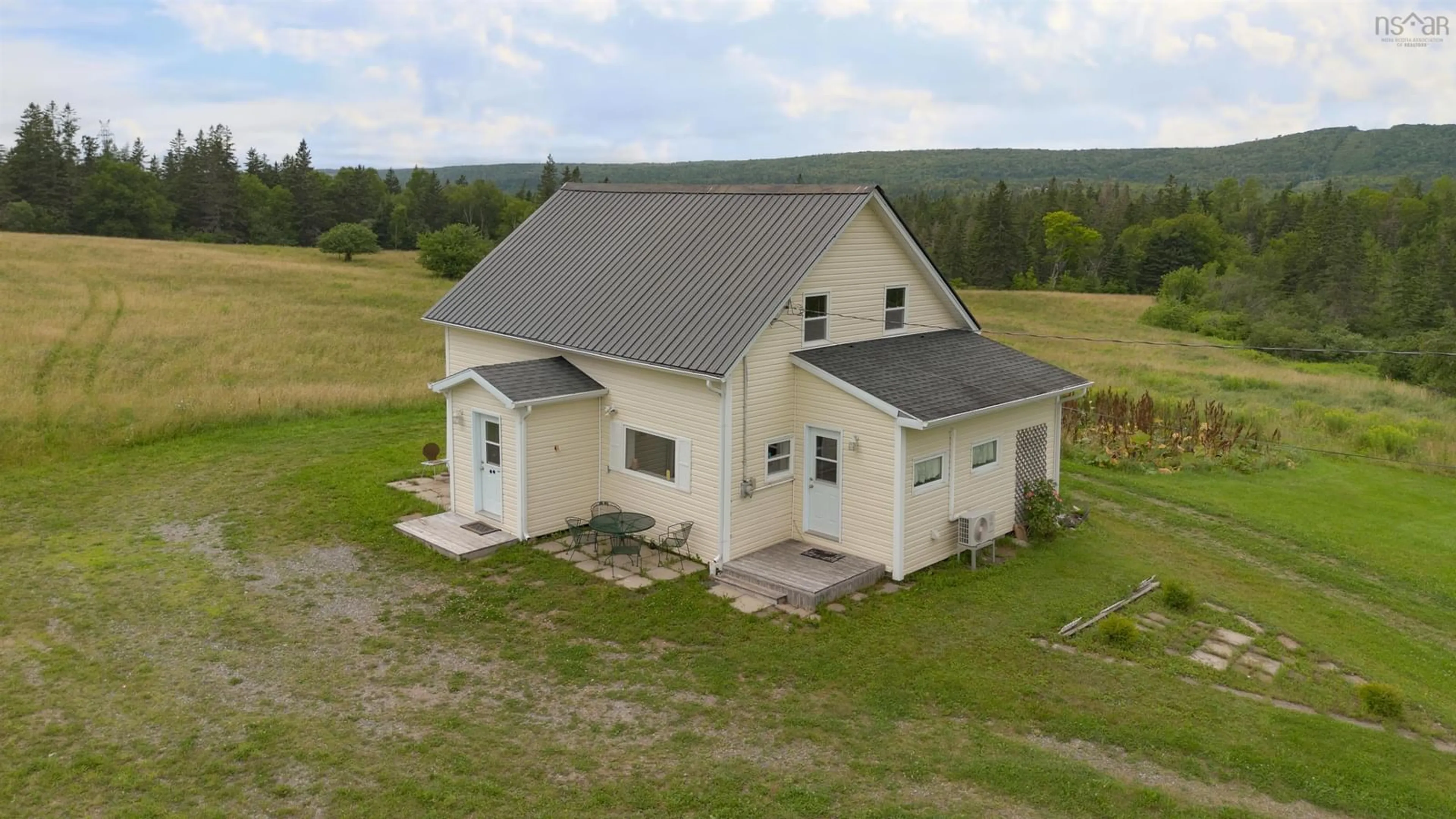 A pic from outside/outdoor area/front of a property/back of a property/a pic from drone, building for 252 Crestdale Dr, Sydney Forks Nova Scotia B1L 1A2