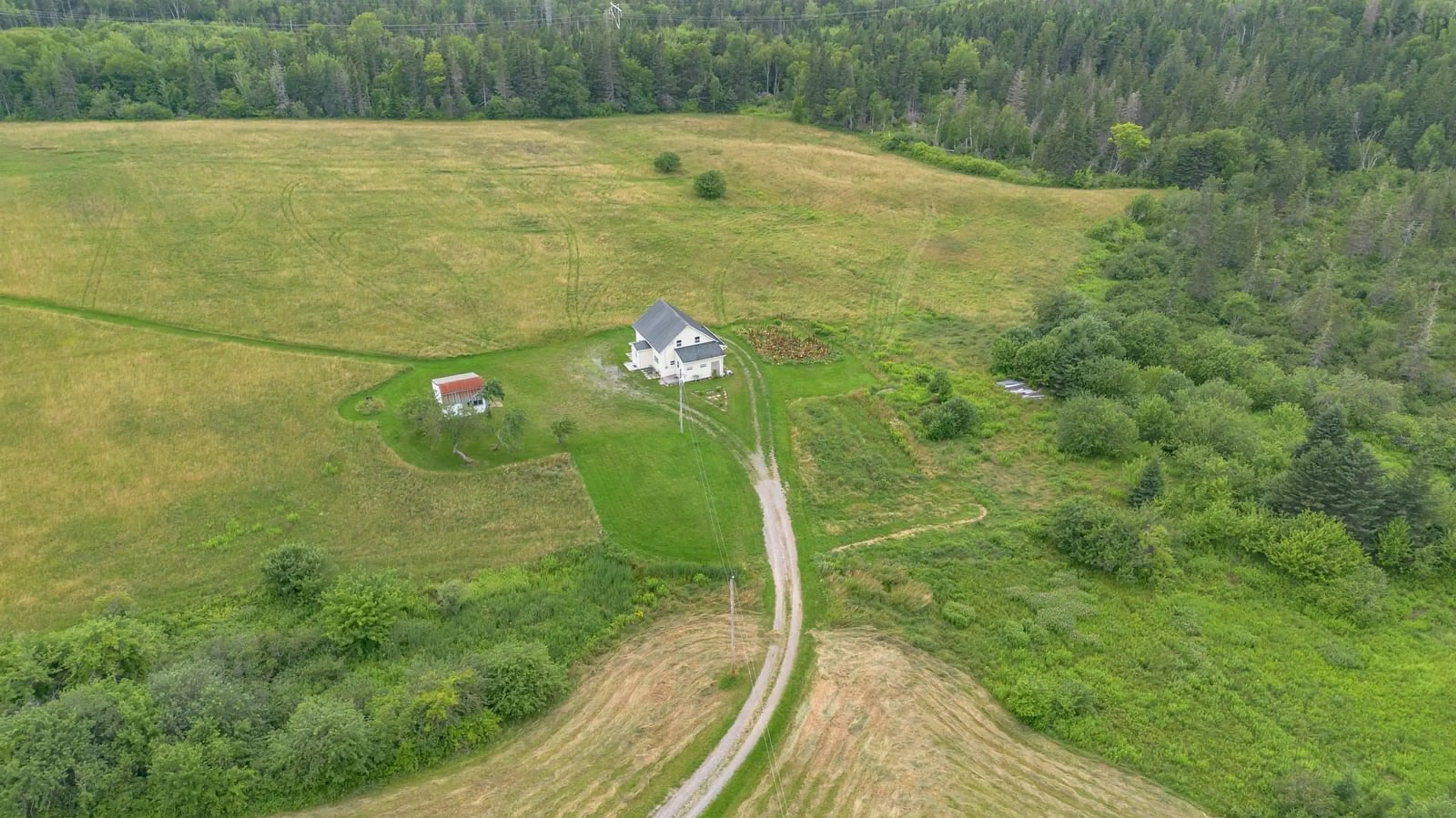A pic from outside/outdoor area/front of a property/back of a property/a pic from drone, unknown for 252 Crestdale Dr, Sydney Forks Nova Scotia B1L 1A2