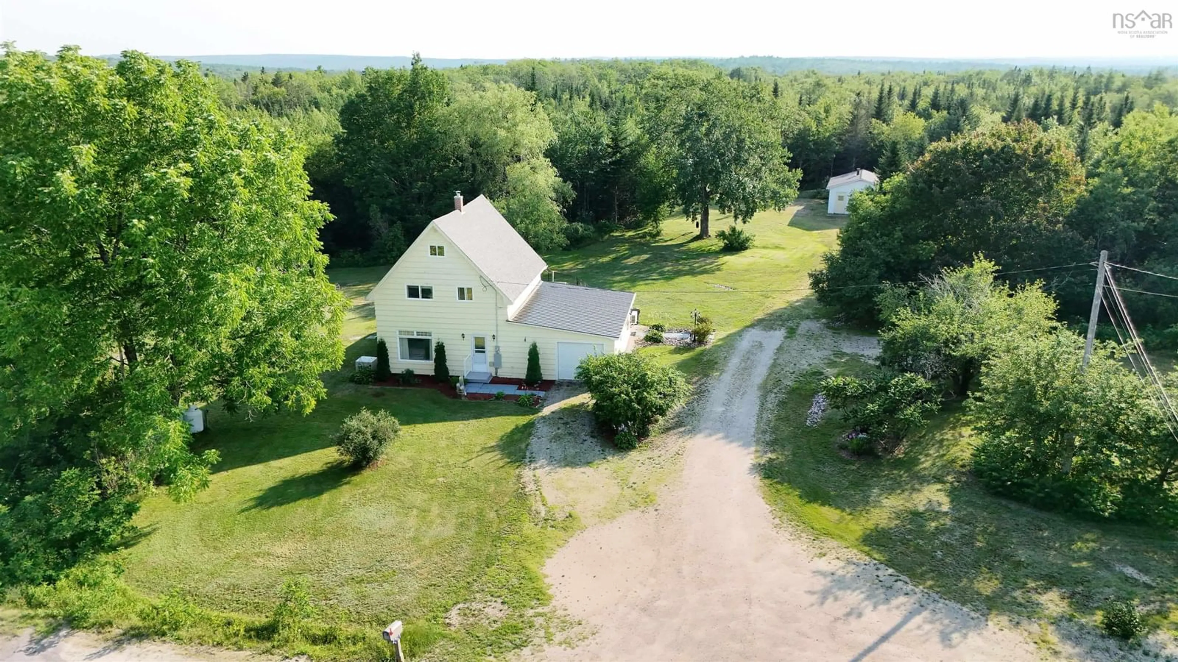 A pic from outside/outdoor area/front of a property/back of a property/a pic from drone, water/lake/river/ocean view for 2921 Highway 12, Seffernsville Nova Scotia B0J 2M0