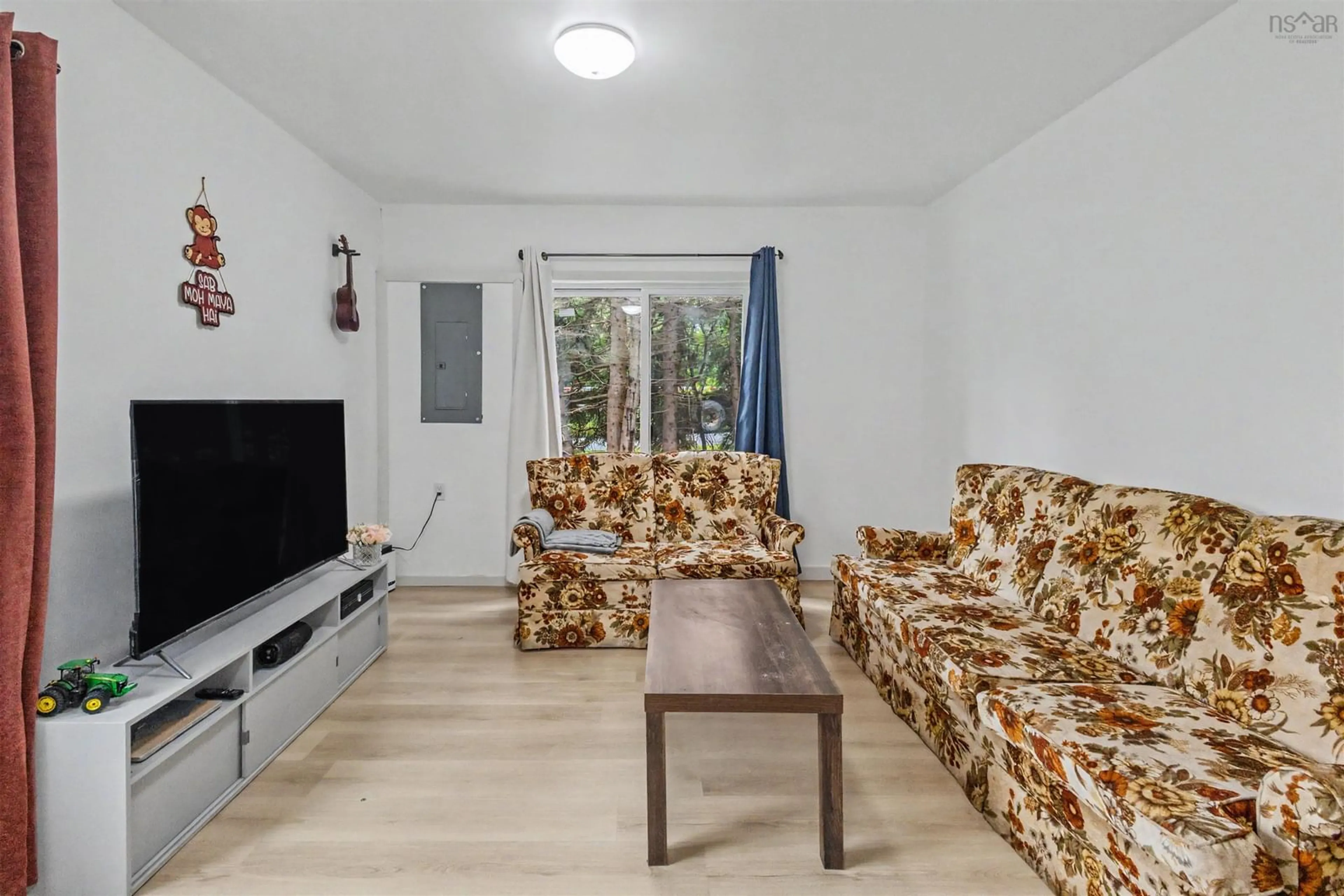Living room with furniture, unknown for 23 Doolans Lane, Grand Lake Road Nova Scotia B1M 1A4