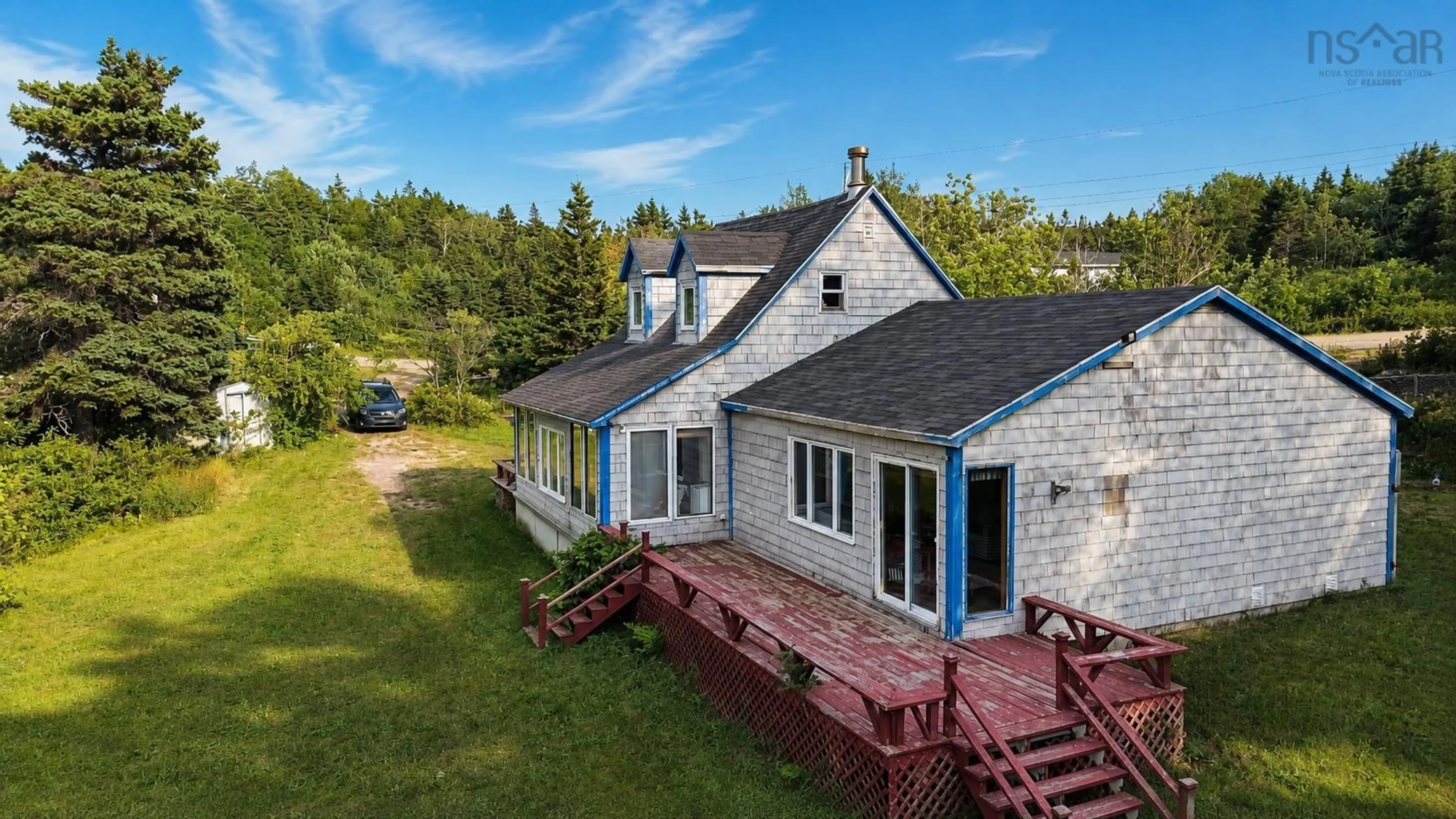 A pic from outside/outdoor area/front of a property/back of a property/a pic from drone, water/lake/river/ocean view for 1251 White Point Rd, Smelt Brook Nova Scotia B0C 1G0