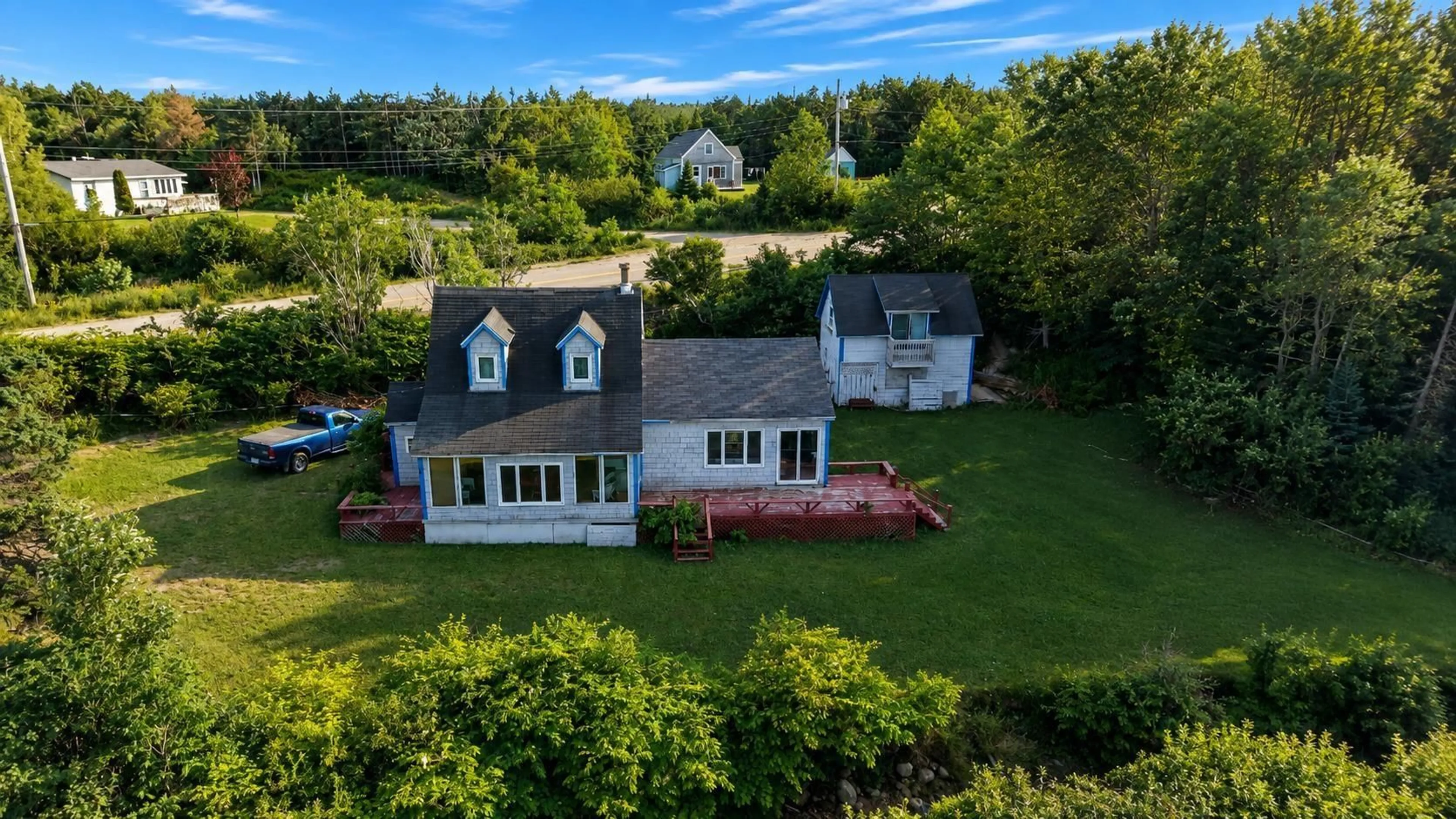 A pic from outside/outdoor area/front of a property/back of a property/a pic from drone, water/lake/river/ocean view for 1251 White Point Rd, Smelt Brook Nova Scotia B0C 1G0