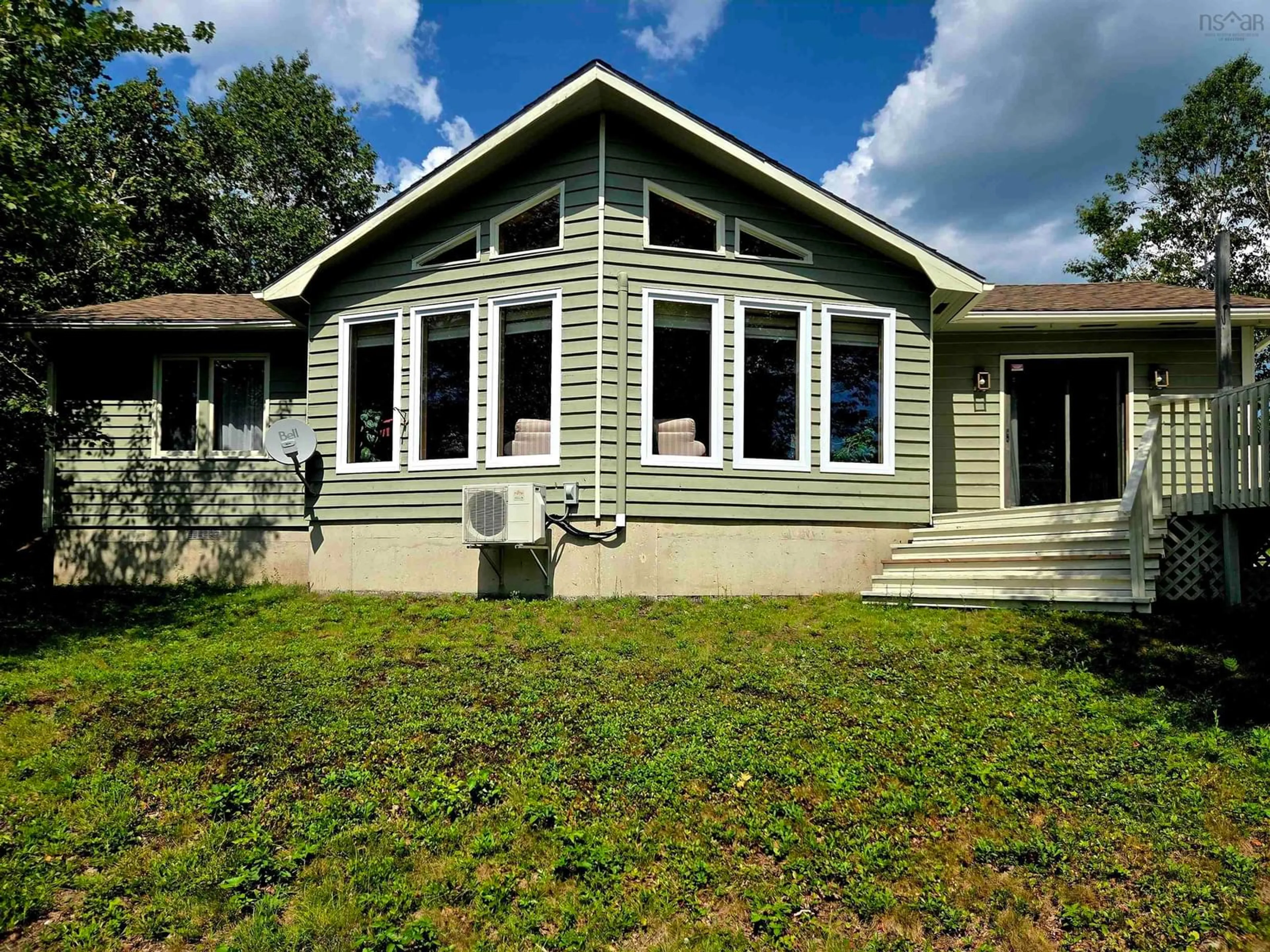 Home with vinyl exterior material, building for 57 Somerset Dr, East Sable River Nova Scotia B0T 1V0