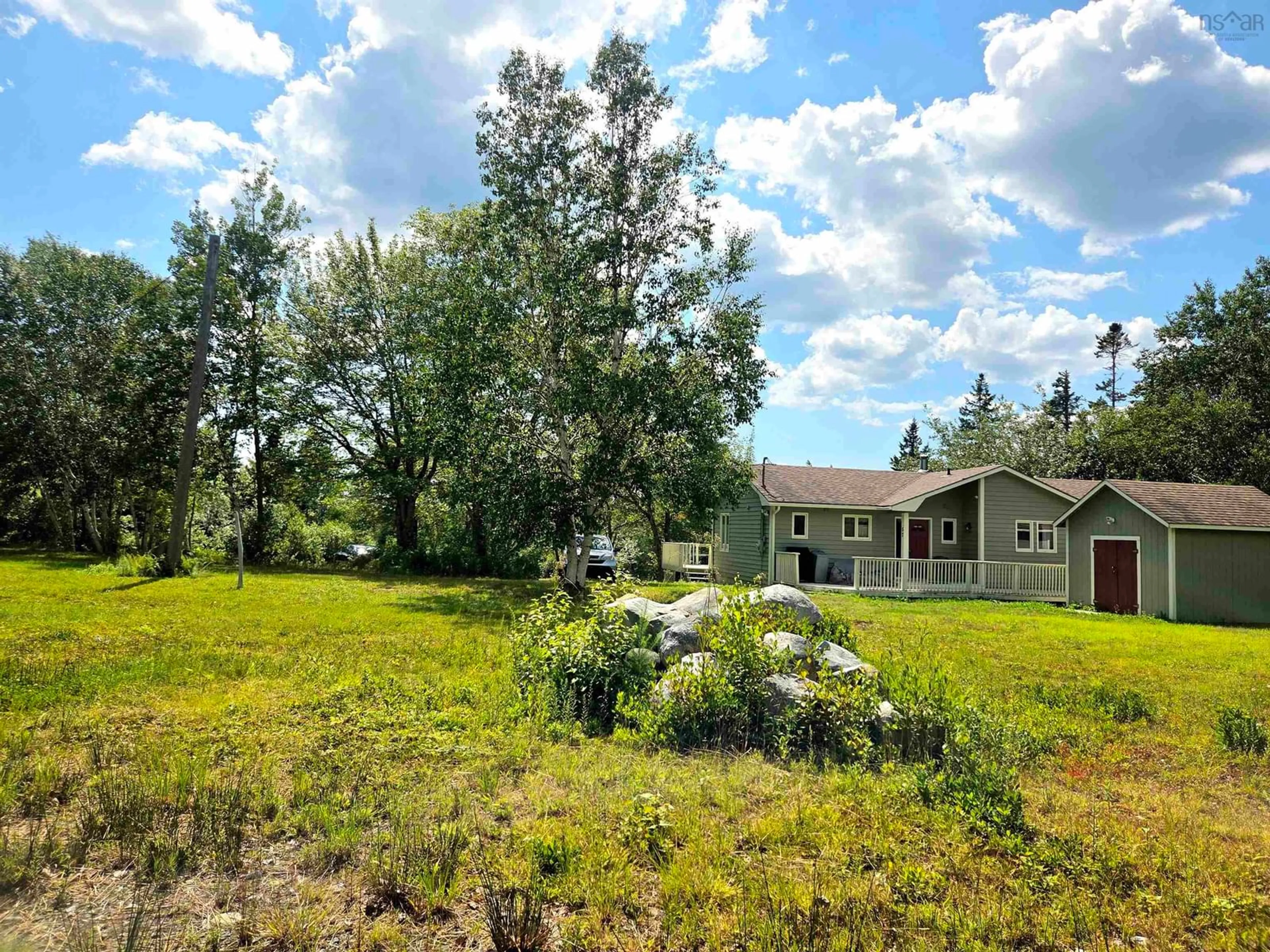 A pic from outside/outdoor area/front of a property/back of a property/a pic from drone, unknown for 57 Somerset Dr, East Sable River Nova Scotia B0T 1V0