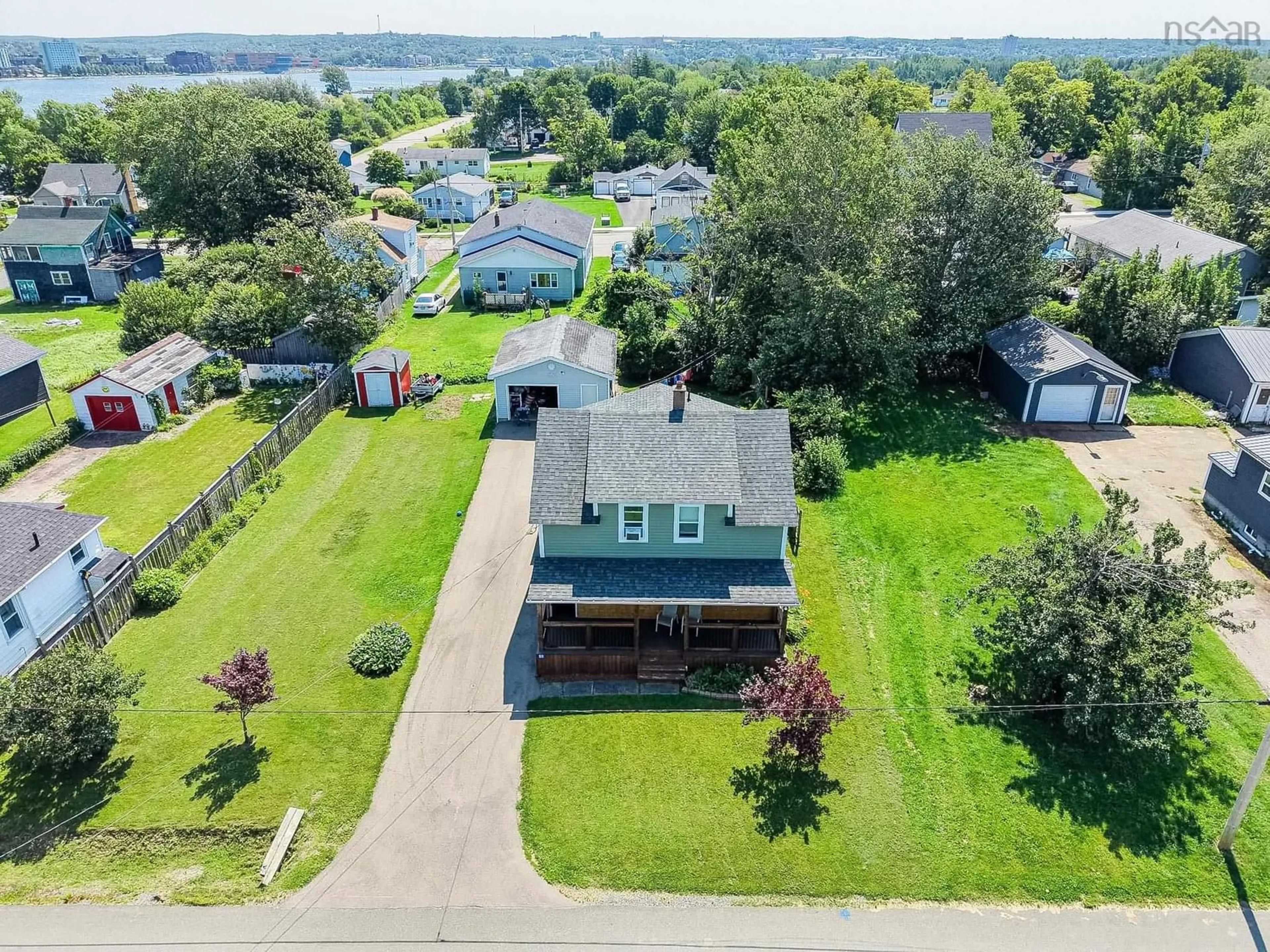 A pic from outside/outdoor area/front of a property/back of a property/a pic from drone, water/lake/river/ocean view for 55 Monteith Ave, Sydney Nova Scotia B1R 1K3