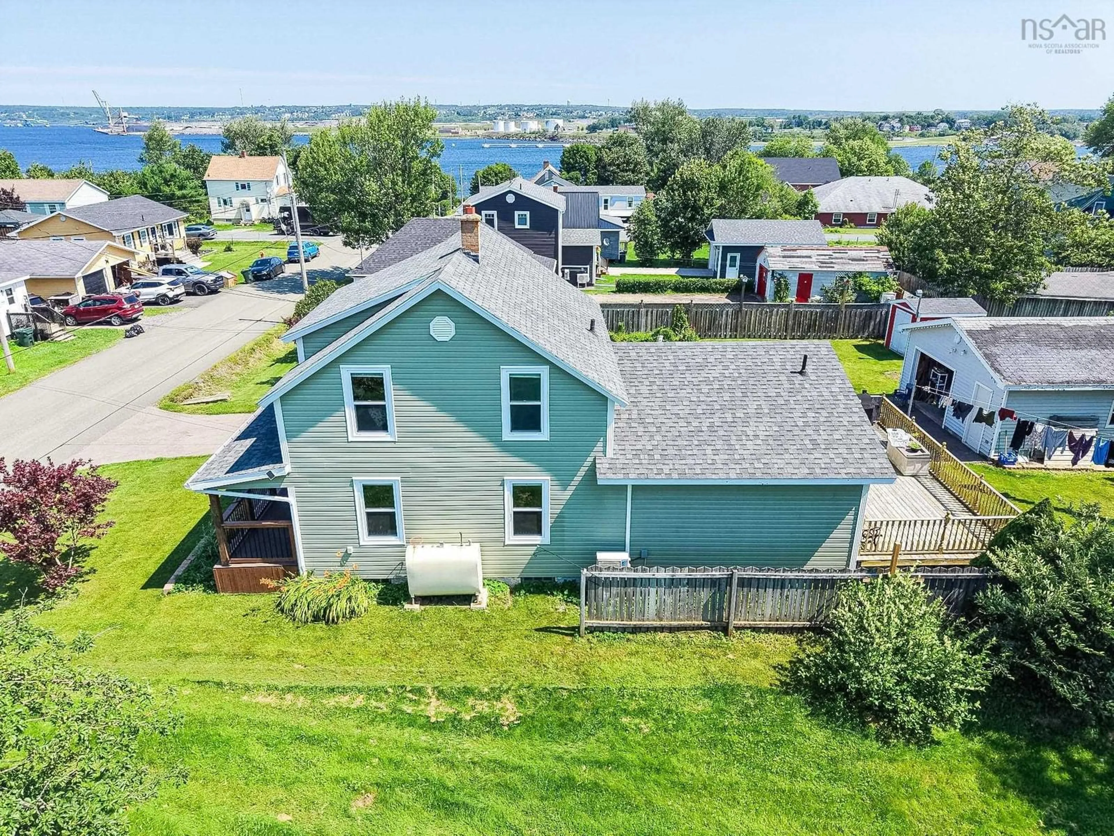 A pic from outside/outdoor area/front of a property/back of a property/a pic from drone, water/lake/river/ocean view for 55 Monteith Ave, Sydney Nova Scotia B1R 1K3