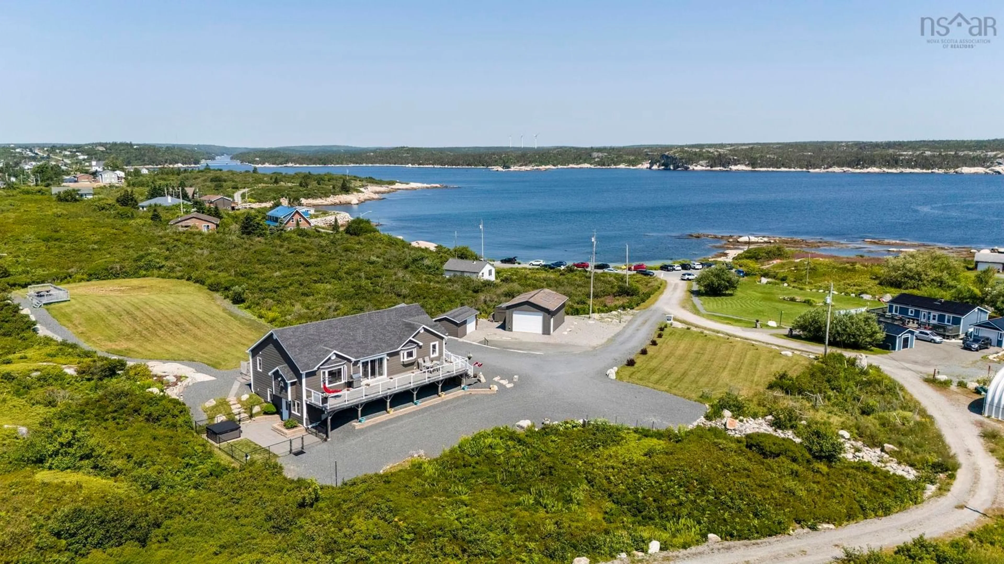 A pic from outside/outdoor area/front of a property/back of a property/a pic from drone, water/lake/river/ocean view for 21 Leo Lane, Terence Bay Nova Scotia B3T 0B7