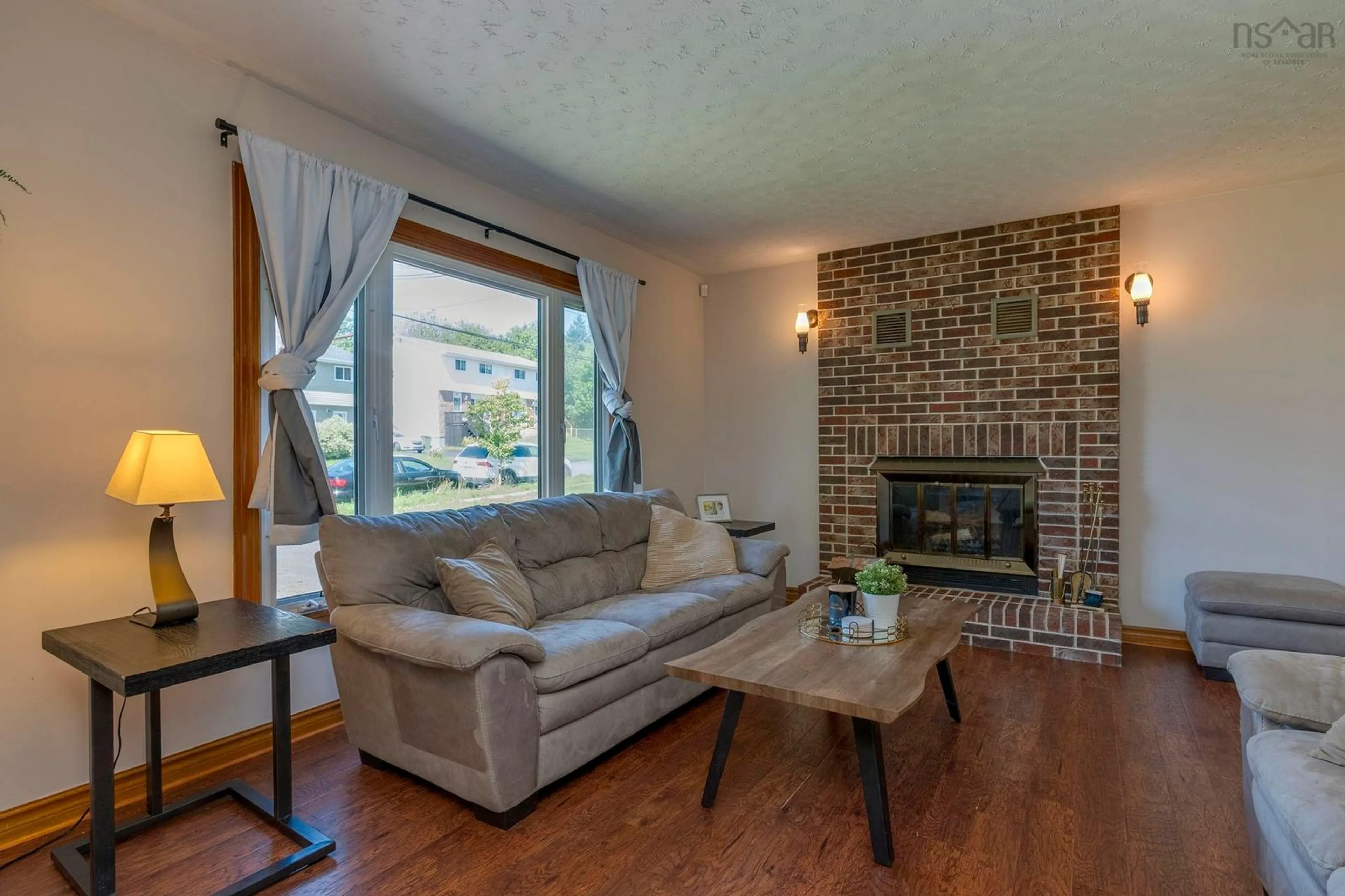 Living room with furniture, wood/laminate floor for 89 Taranaki Dr, Dartmouth Nova Scotia B2W 4X3