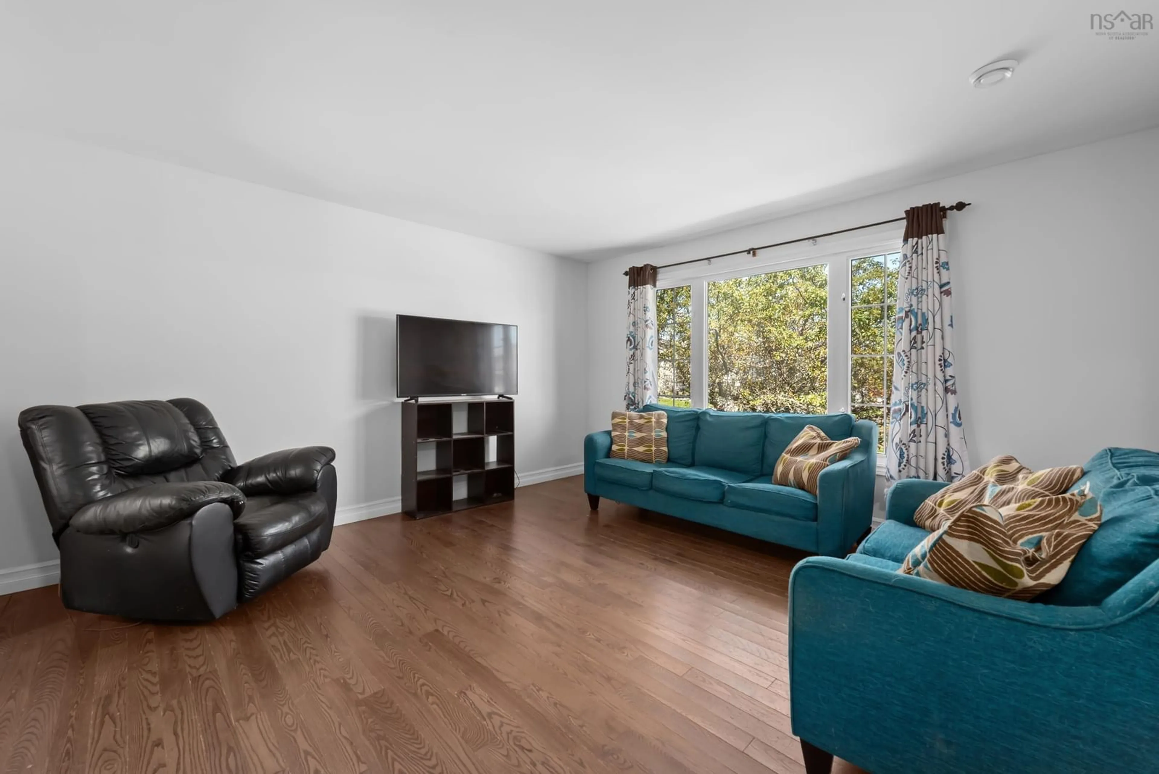 Living room with furniture, wood/laminate floor for 29 Colonna Pl, Dartmouth Nova Scotia B3X 3H8
