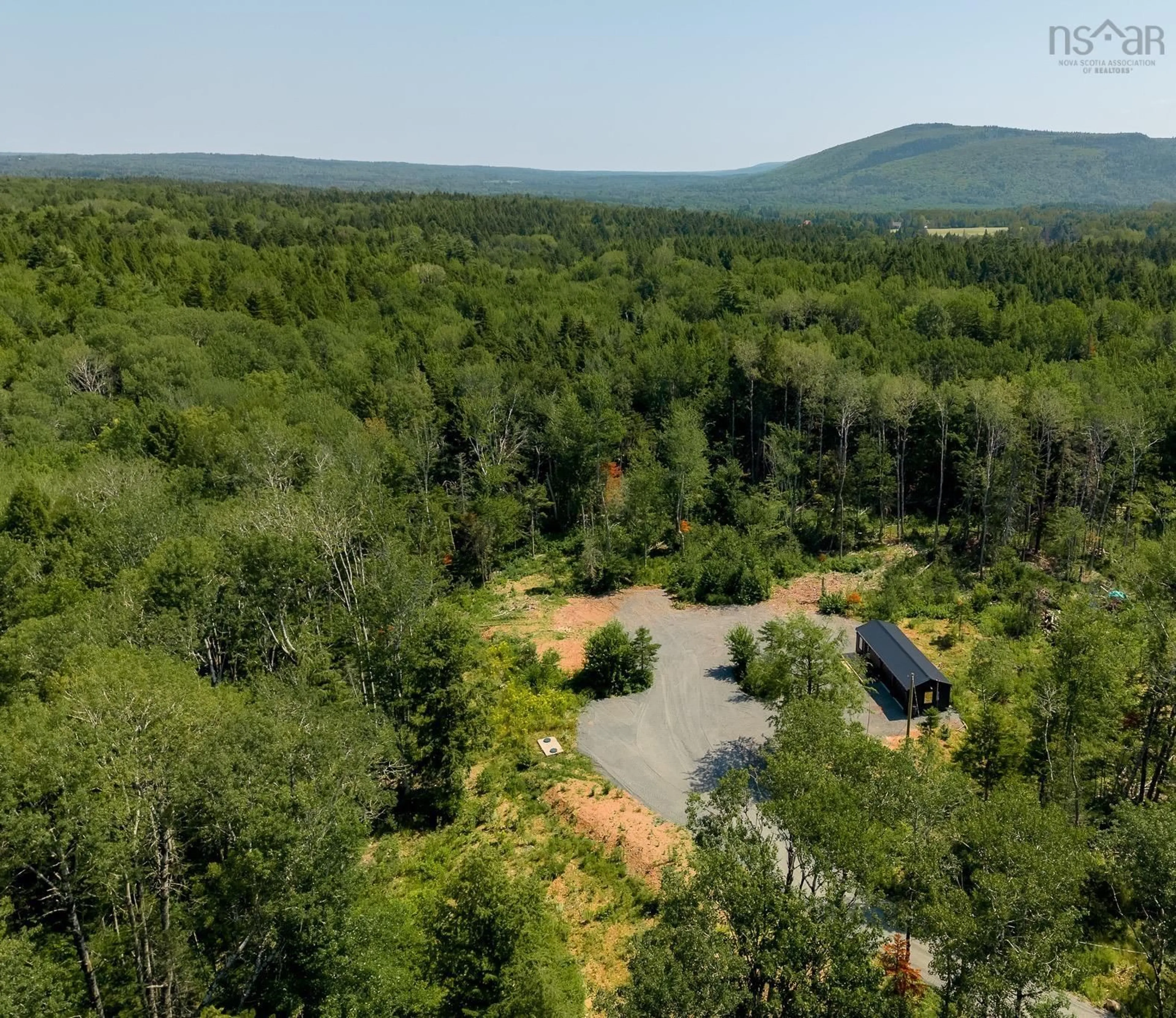 A pic from outside/outdoor area/front of a property/back of a property/a pic from drone, forest/trees view for 52 Hemlock Lane, Wentworth Nova Scotia B0M 1Z0