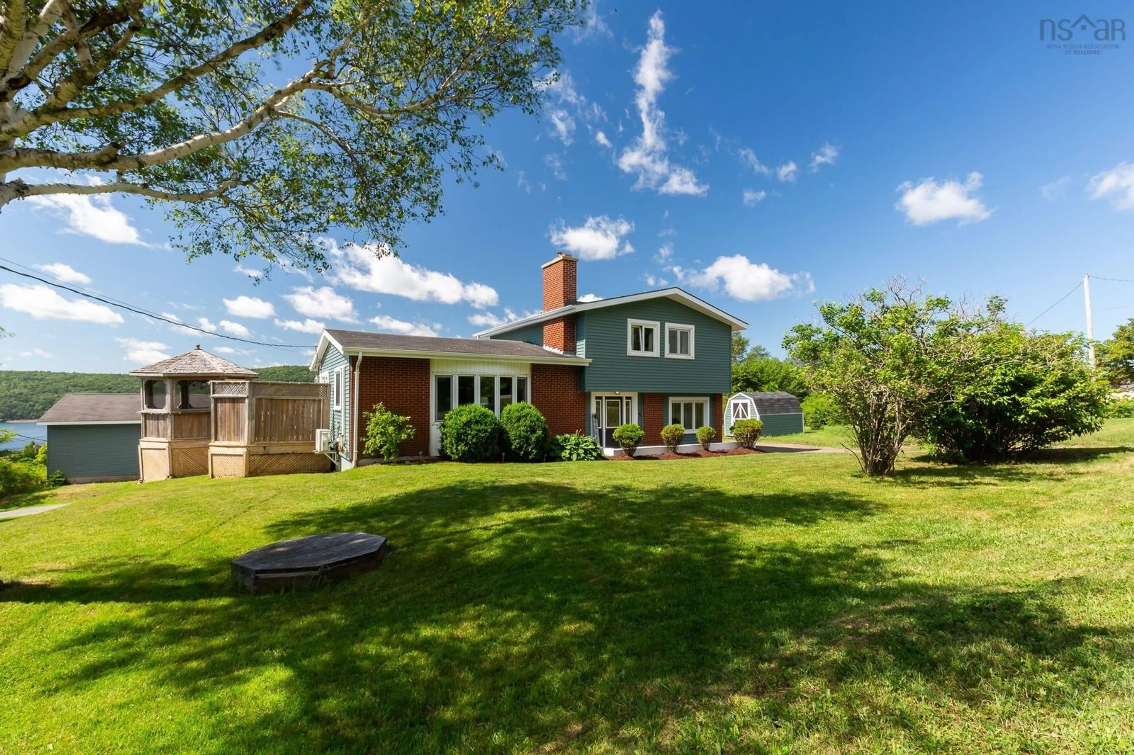 A pic from outside/outdoor area/front of a property/back of a property/a pic from drone, water/lake/river/ocean view for 5 Brown St, Port Hastings Nova Scotia B9A 1L6