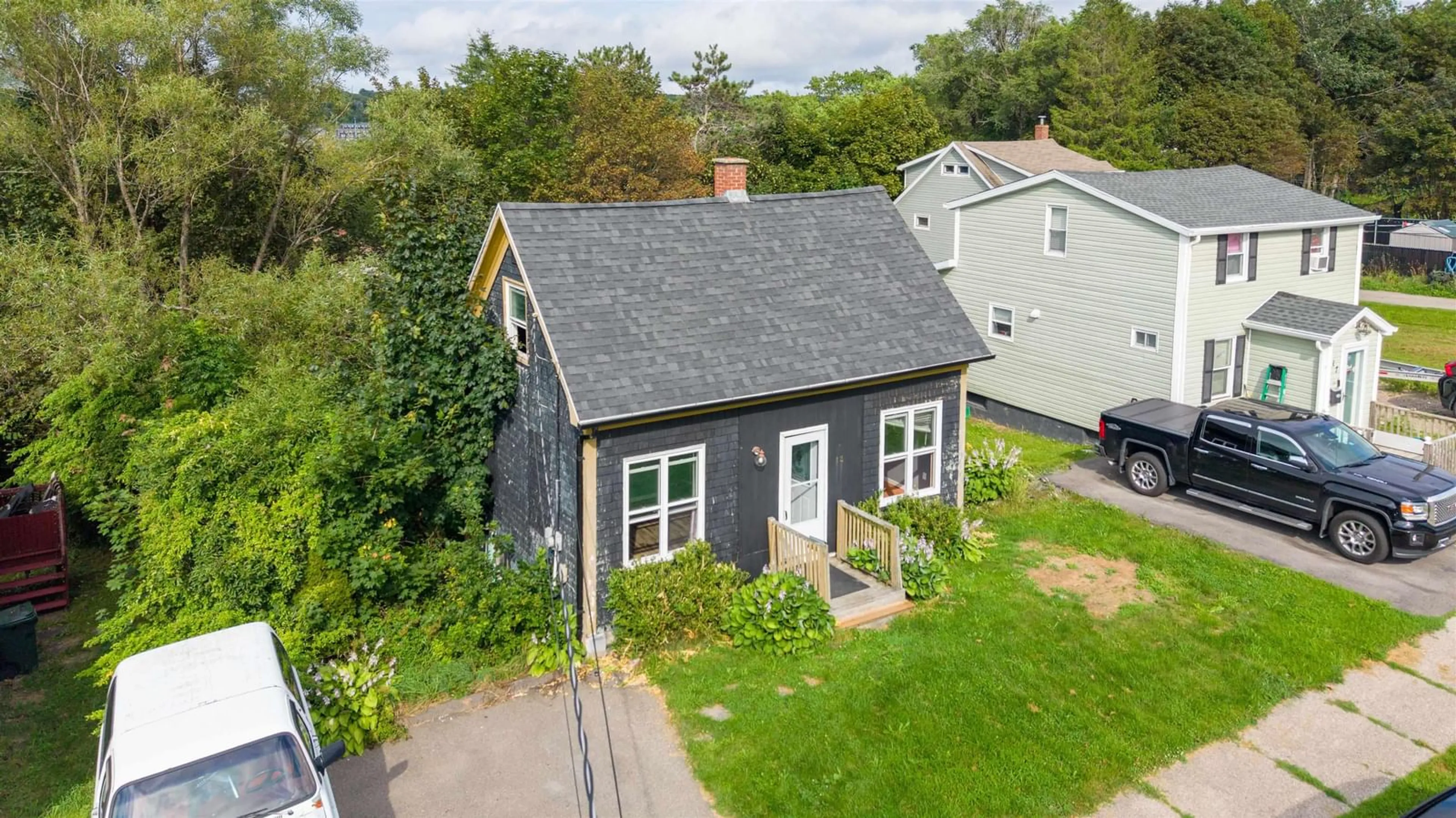 A pic from outside/outdoor area/front of a property/back of a property/a pic from drone, street for 13 Central St, Sydney Nova Scotia B1P 2A7