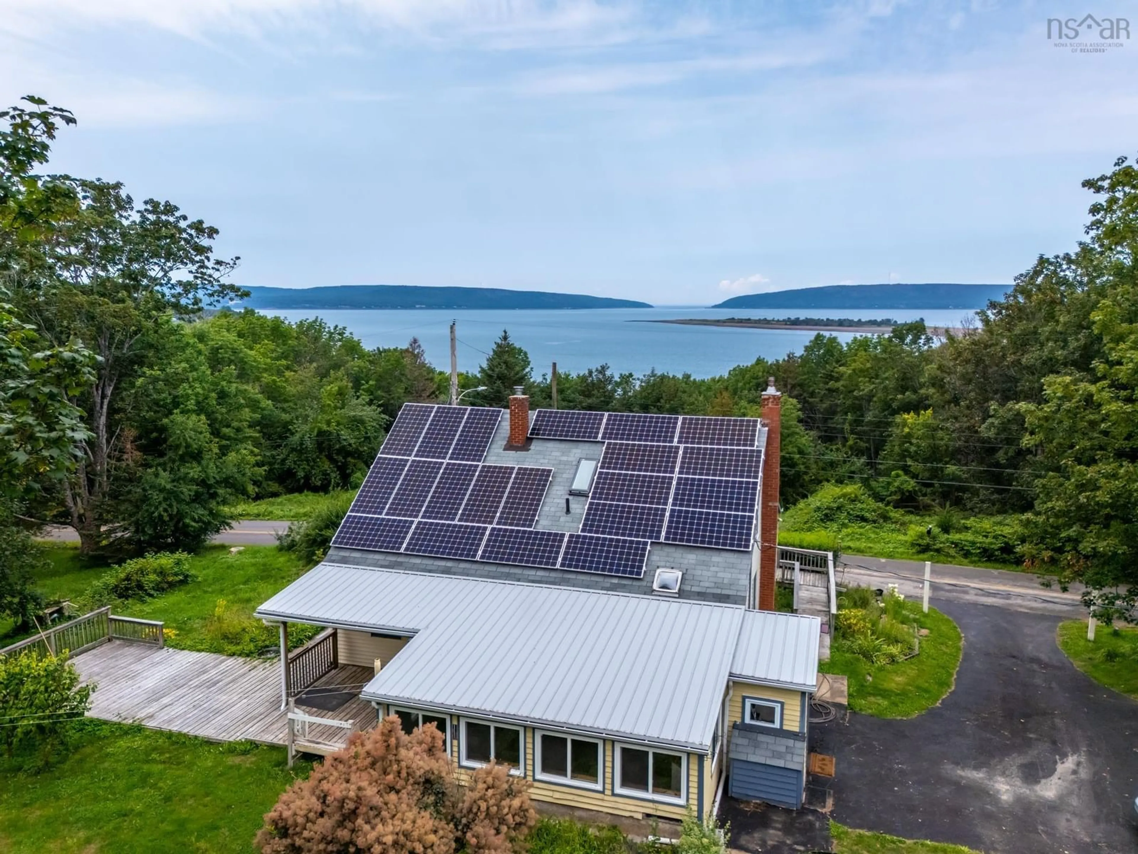 A pic from outside/outdoor area/front of a property/back of a property/a pic from drone, water/lake/river/ocean view for 172 East Old Post Road, Smiths Cove Nova Scotia B0S 1S0