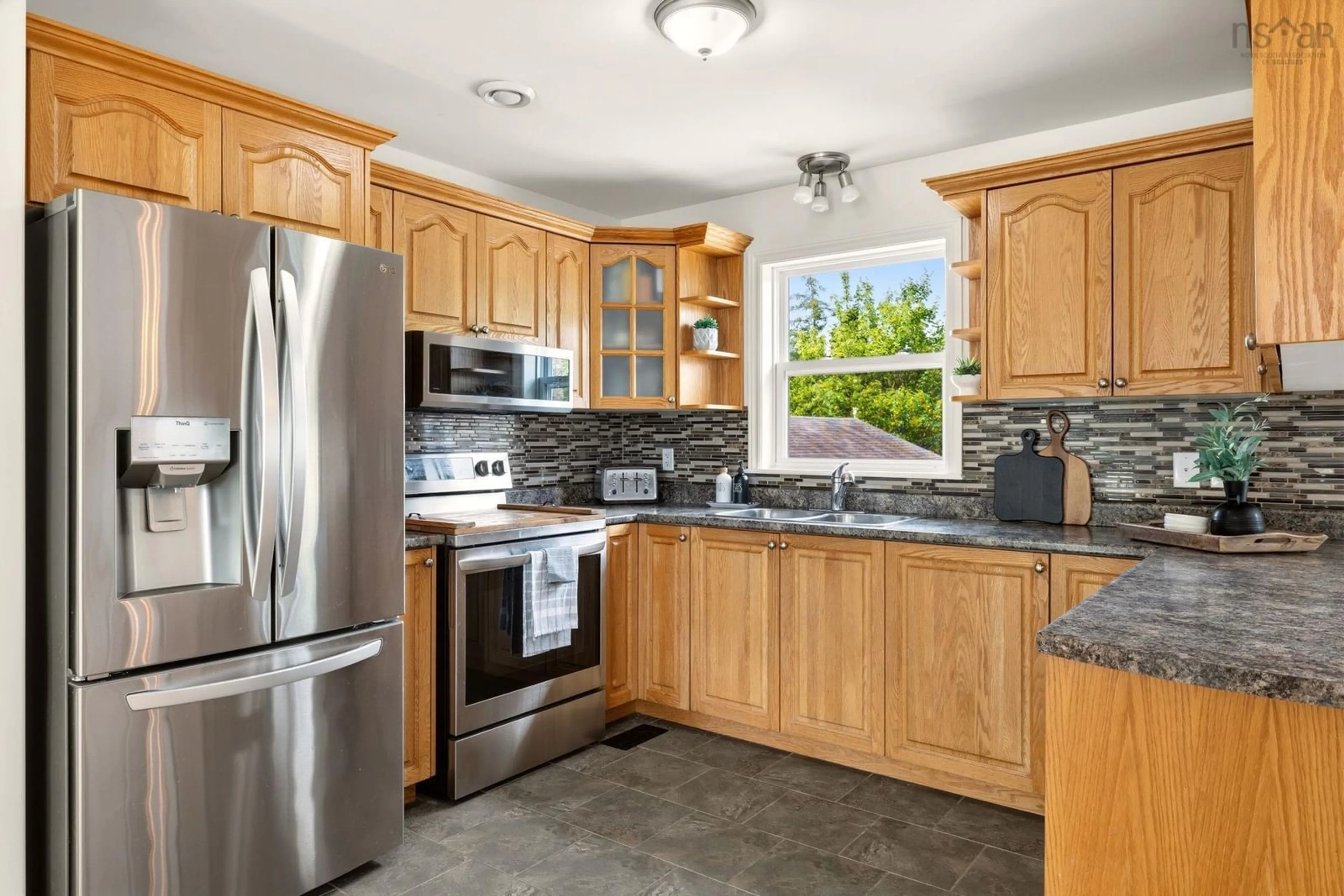 Standard kitchen, ceramic/tile floor for 19 Marjorie Dr, West Porters Lake Nova Scotia B3E 1N2