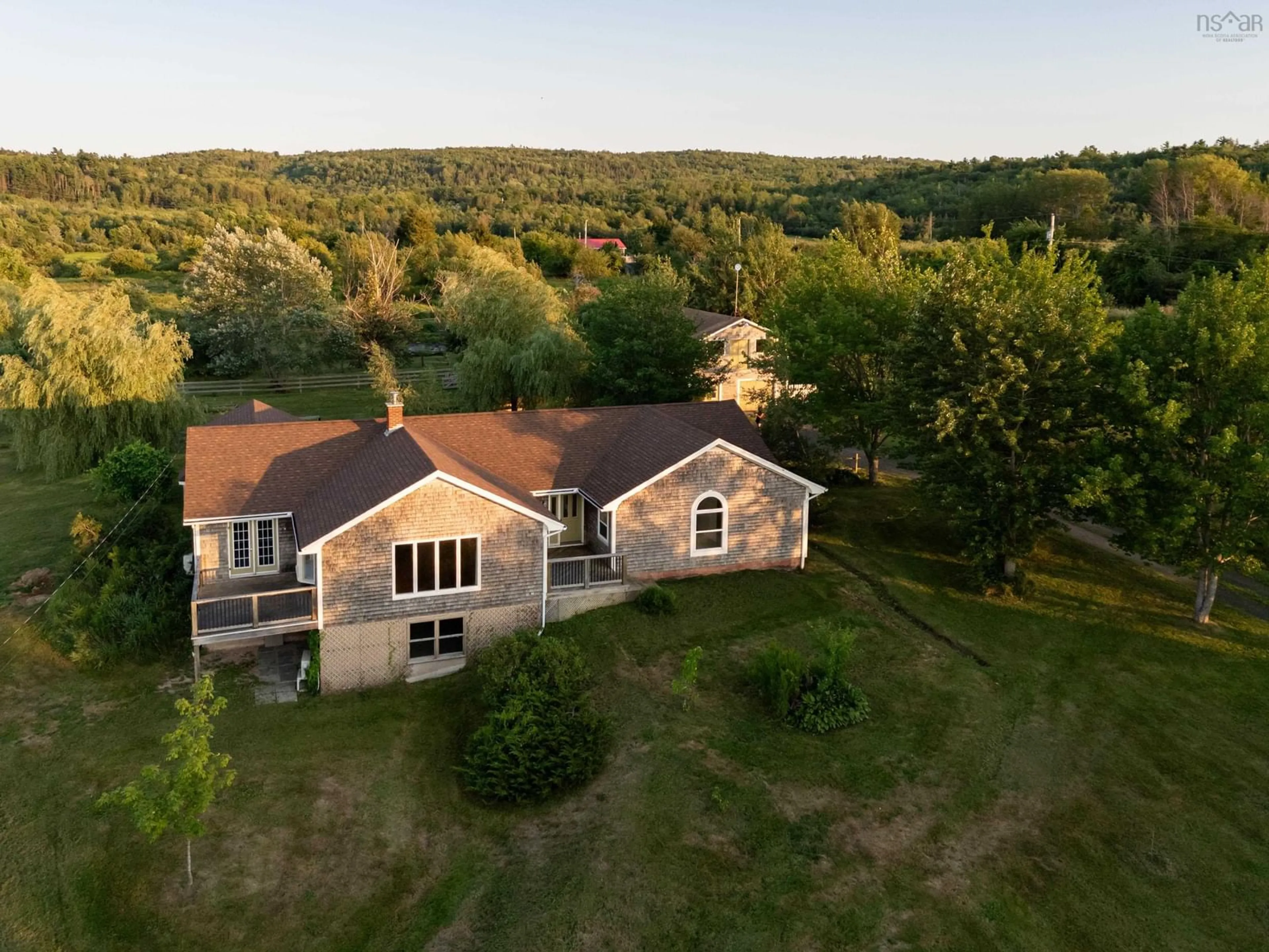 A pic from outside/outdoor area/front of a property/back of a property/a pic from drone, unknown for 2632 Highway 201, Tupperville Nova Scotia B0S 1C0