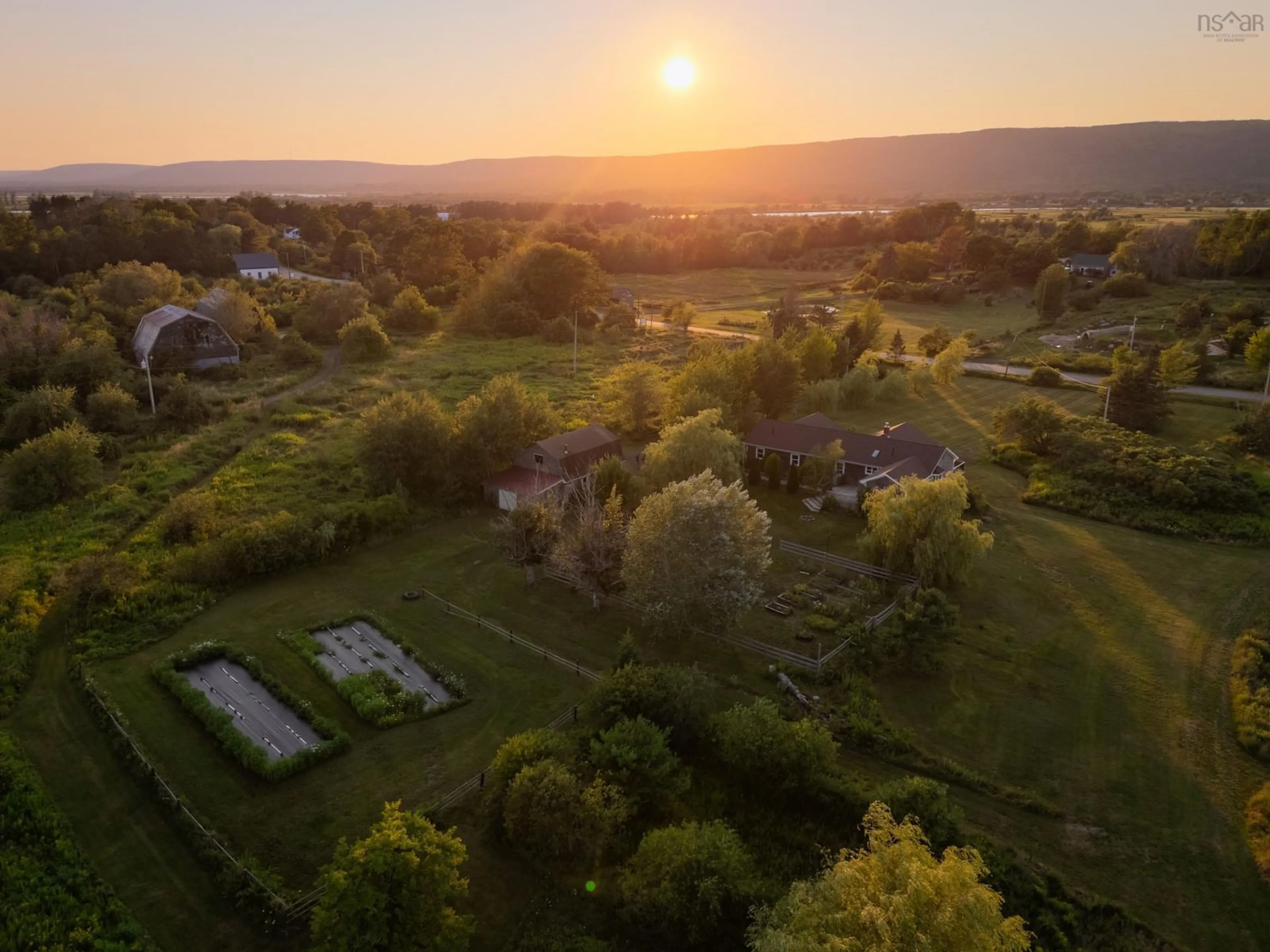 A pic from outside/outdoor area/front of a property/back of a property/a pic from drone, unknown for 2632 Highway 201, Tupperville Nova Scotia B0S 1C0