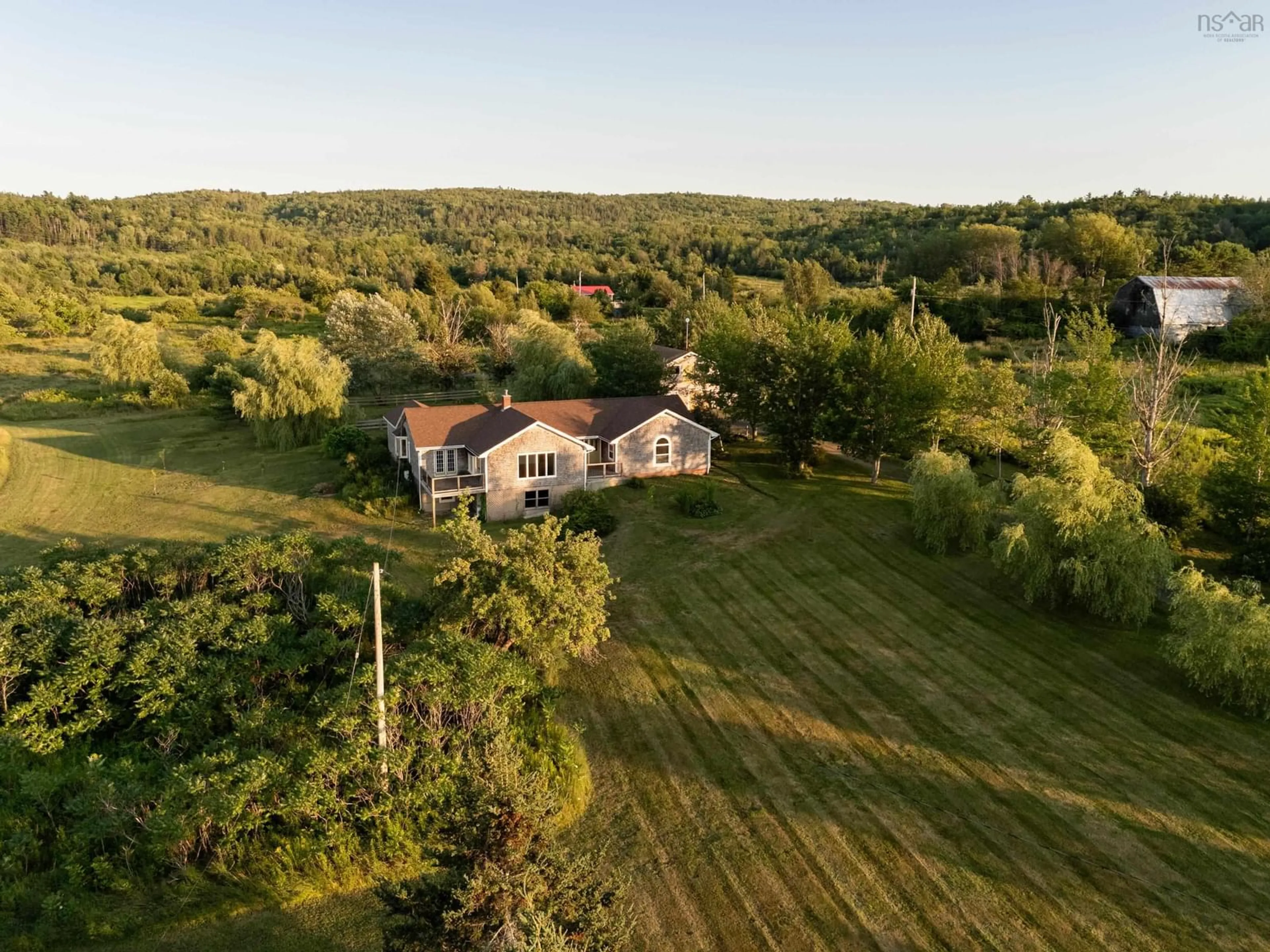 A pic from outside/outdoor area/front of a property/back of a property/a pic from drone, unknown for 2632 Highway 201, Tupperville Nova Scotia B0S 1C0