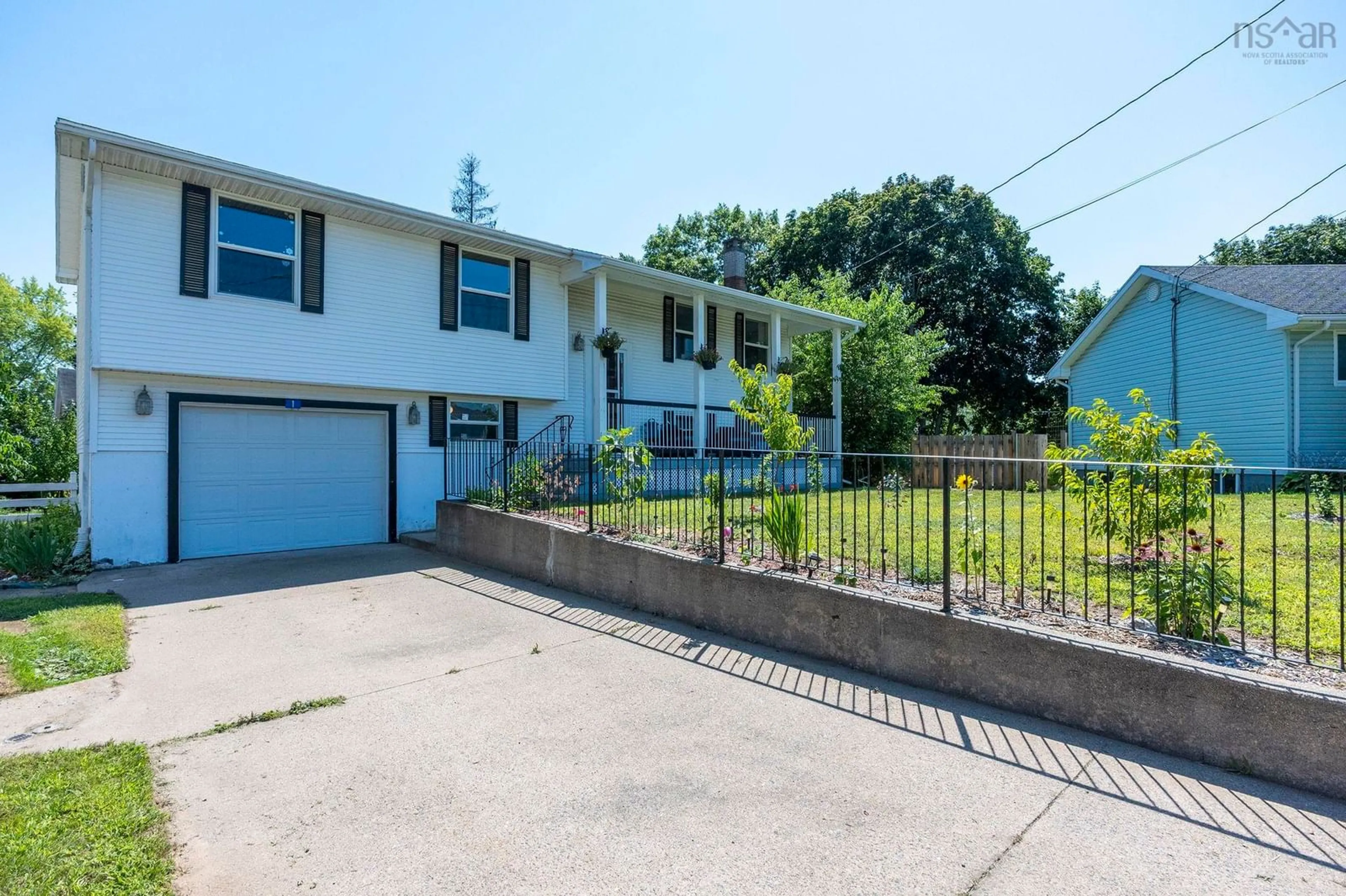Home with vinyl exterior material, street for 1 Mckenzie Dr, Middleton Nova Scotia B0S 1P0