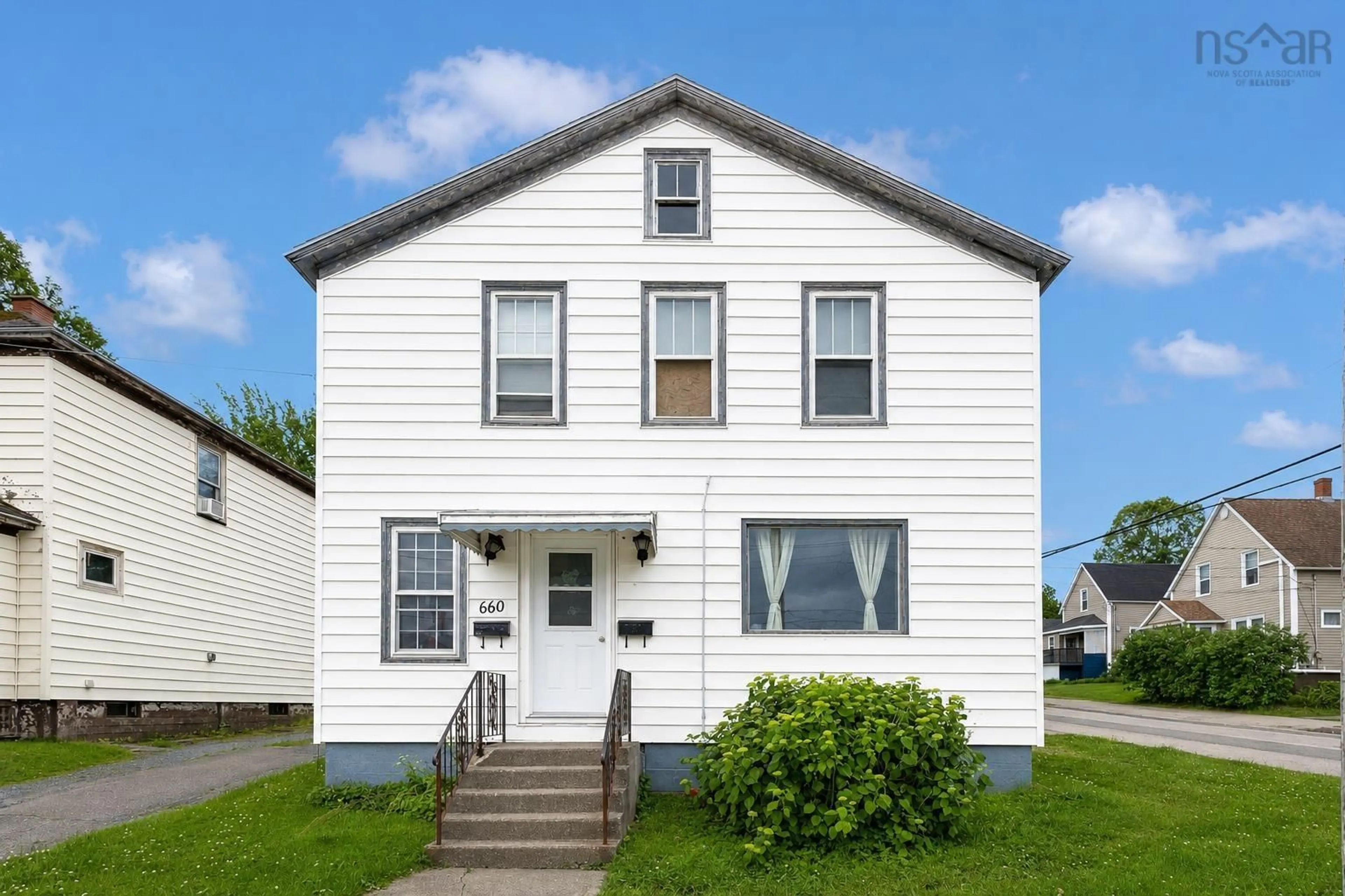 Home with vinyl exterior material, street for 660 Upper Prince St, Sydney Nova Scotia B1P 5N1