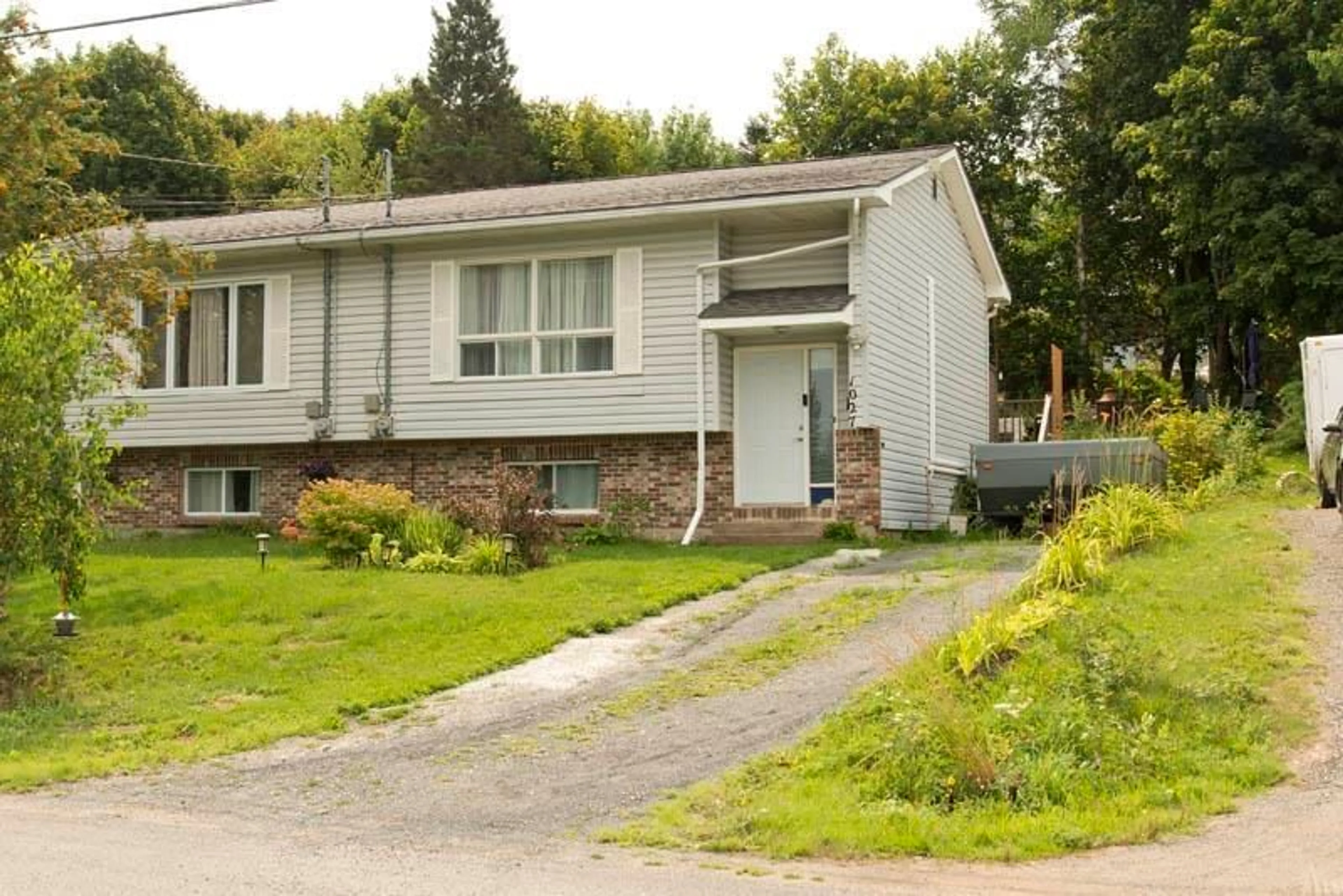 Home with vinyl exterior material, street for 1027 Marie Crescent, Kentville Nova Scotia B4N 4K4