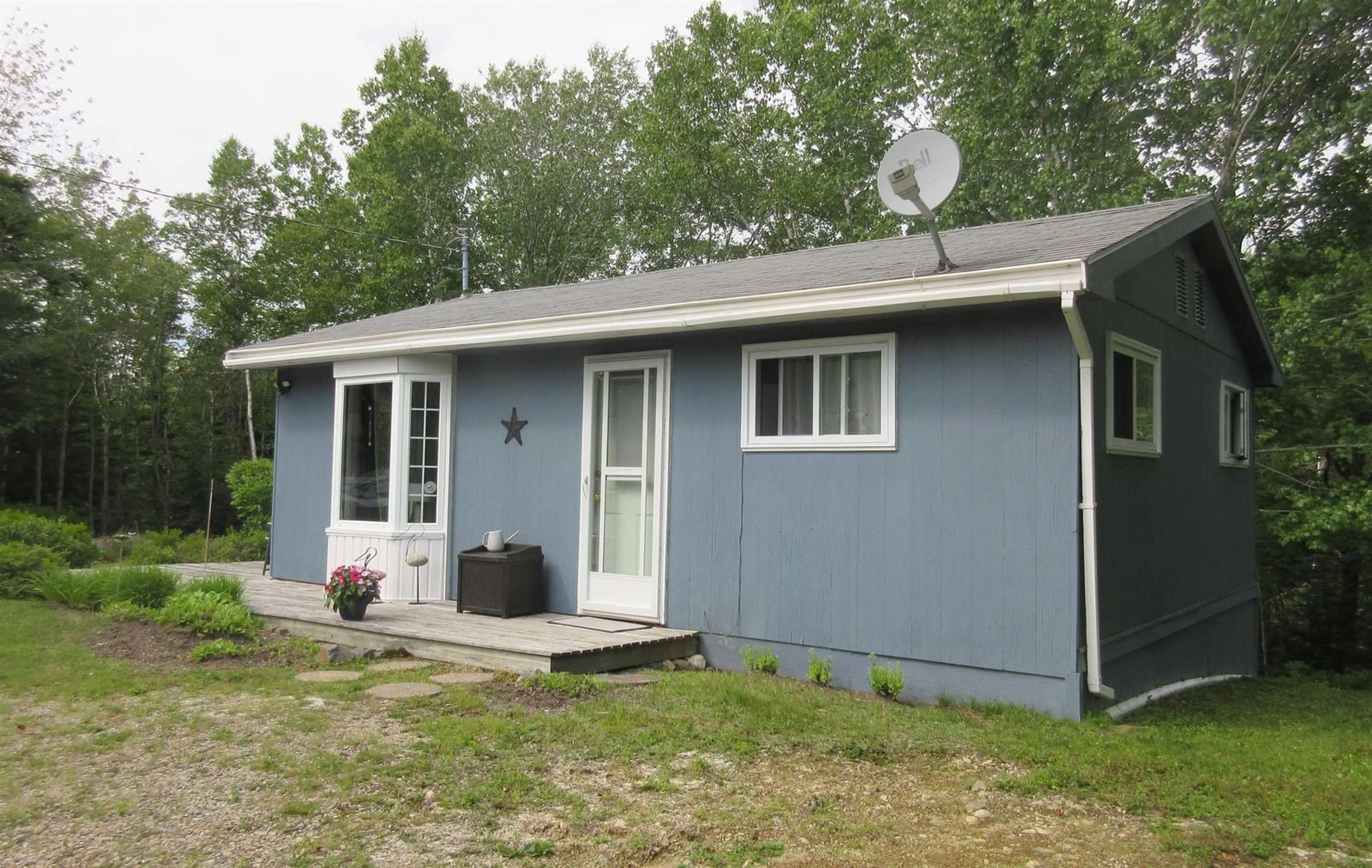 Home with vinyl exterior material, street for 30 Woods Rd, Bayswater Nova Scotia B0J 1T0